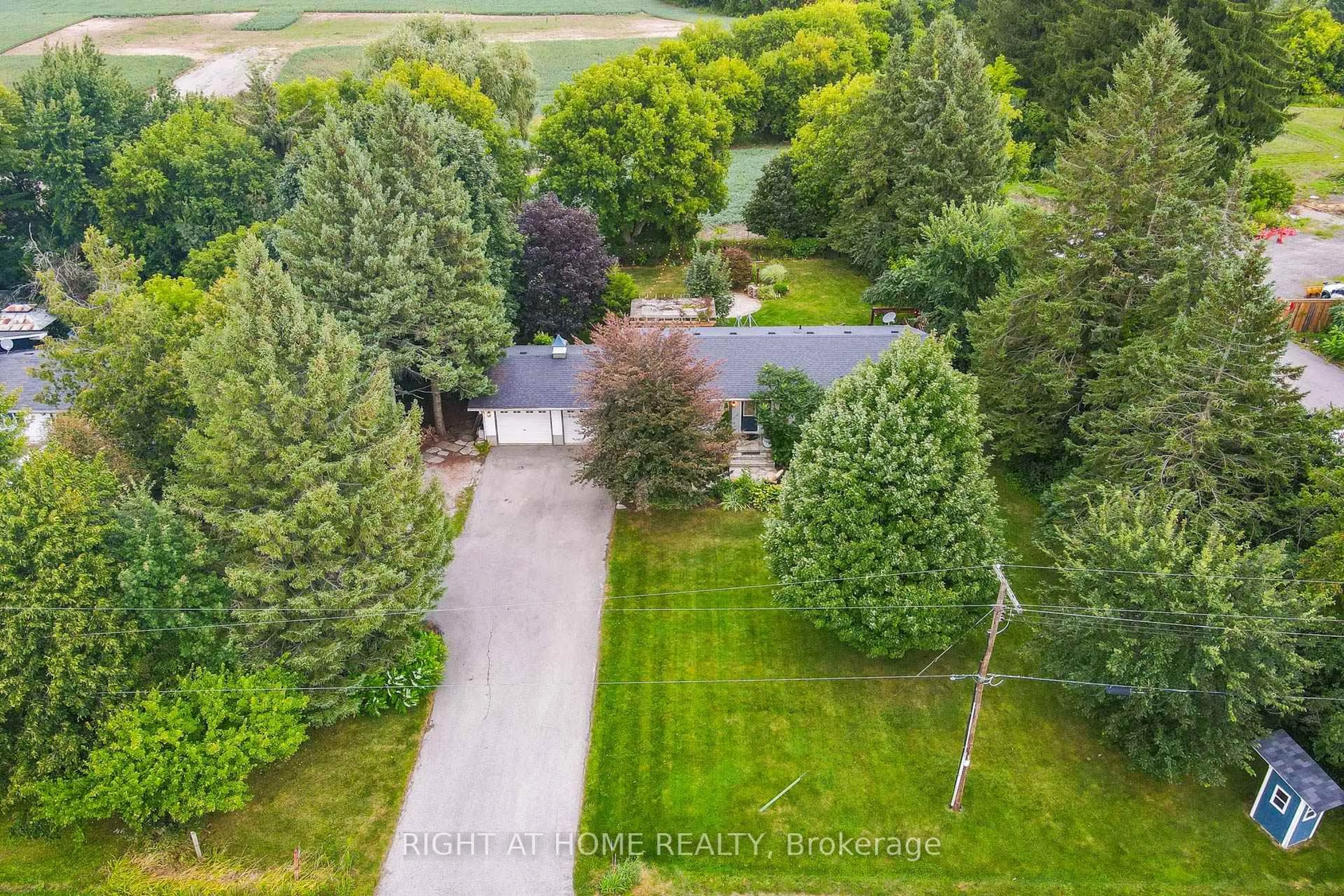 A pic from outside/outdoor area/front of a property/back of a property/a pic from drone, unknown for 11749 Tenth Line, Halton Hills Ontario L7G 4S7