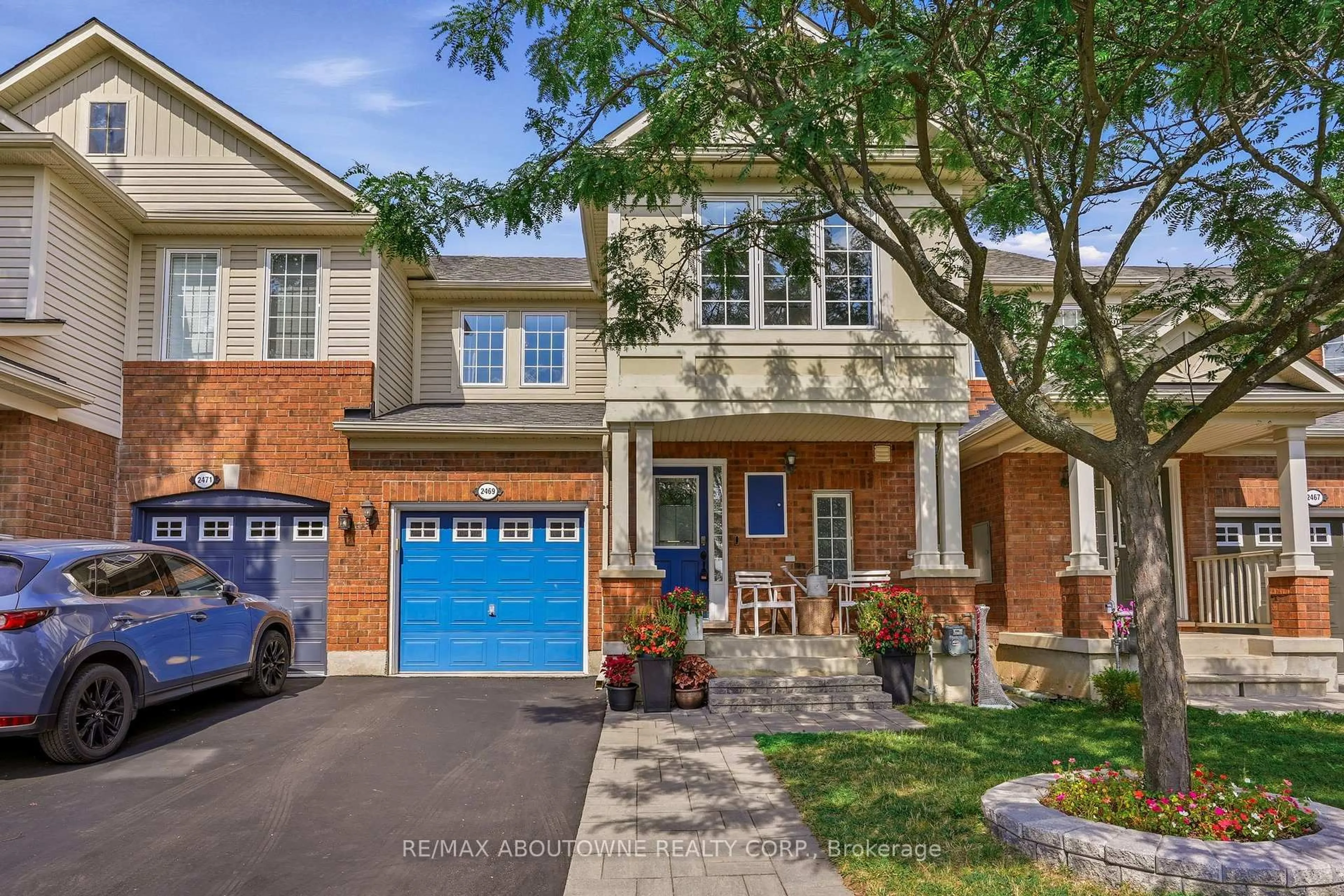 Home with brick exterior material, street for 2469 Springforest Dr, Oakville Ontario L6M 0A2