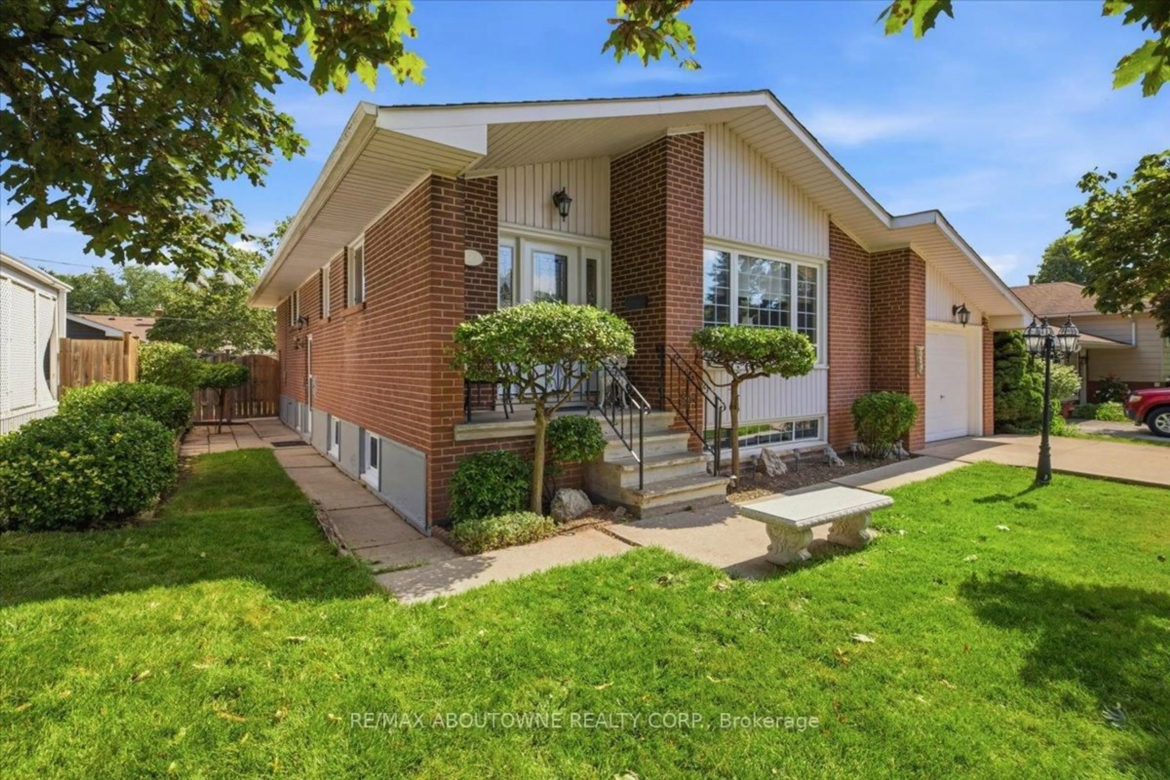 Home with brick exterior material, street for 343 Duncombe Dr, Burlington Ontario L7L 4M2