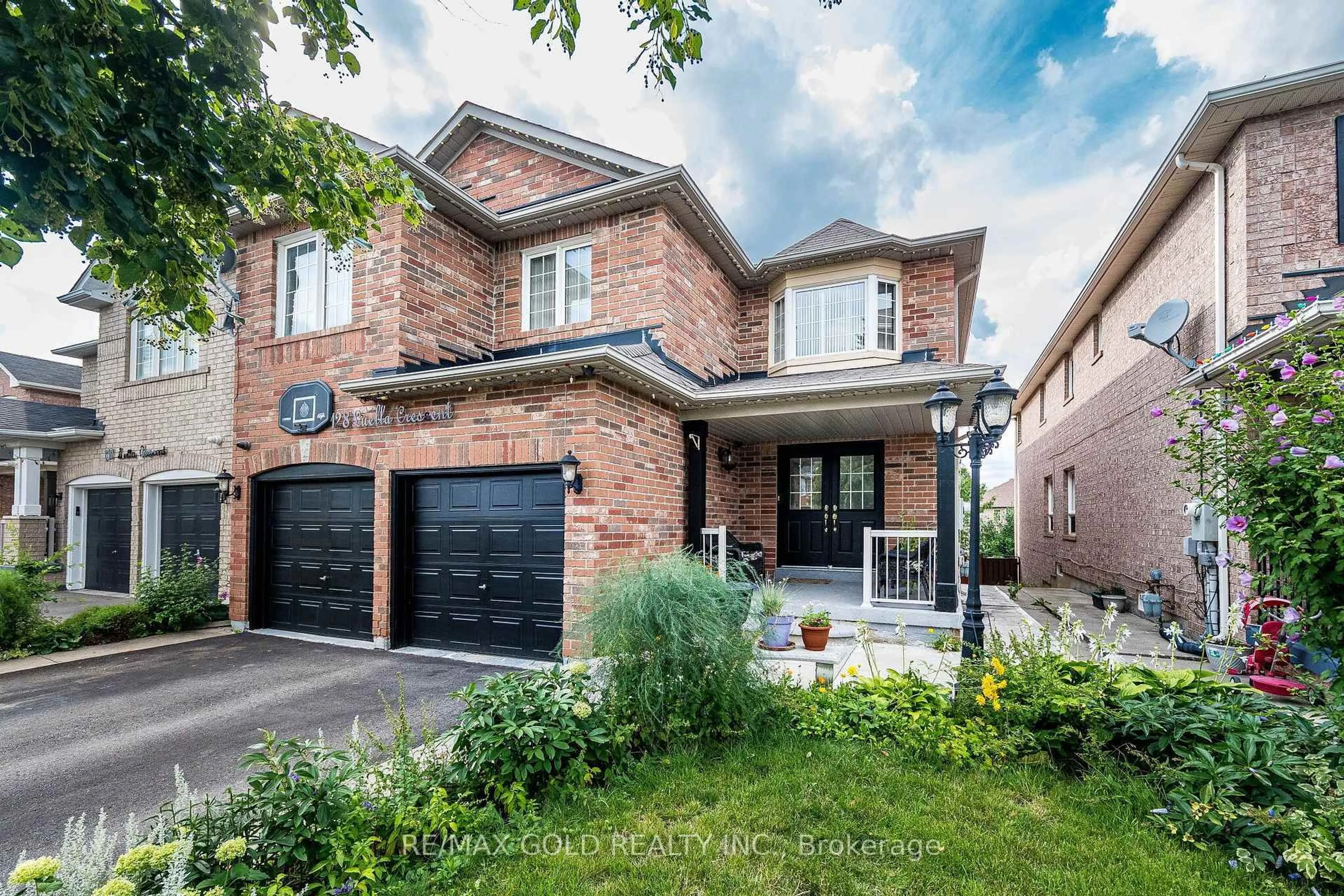 Home with brick exterior material, street for 128 Luella Cres, Brampton Ontario L7A 3H5
