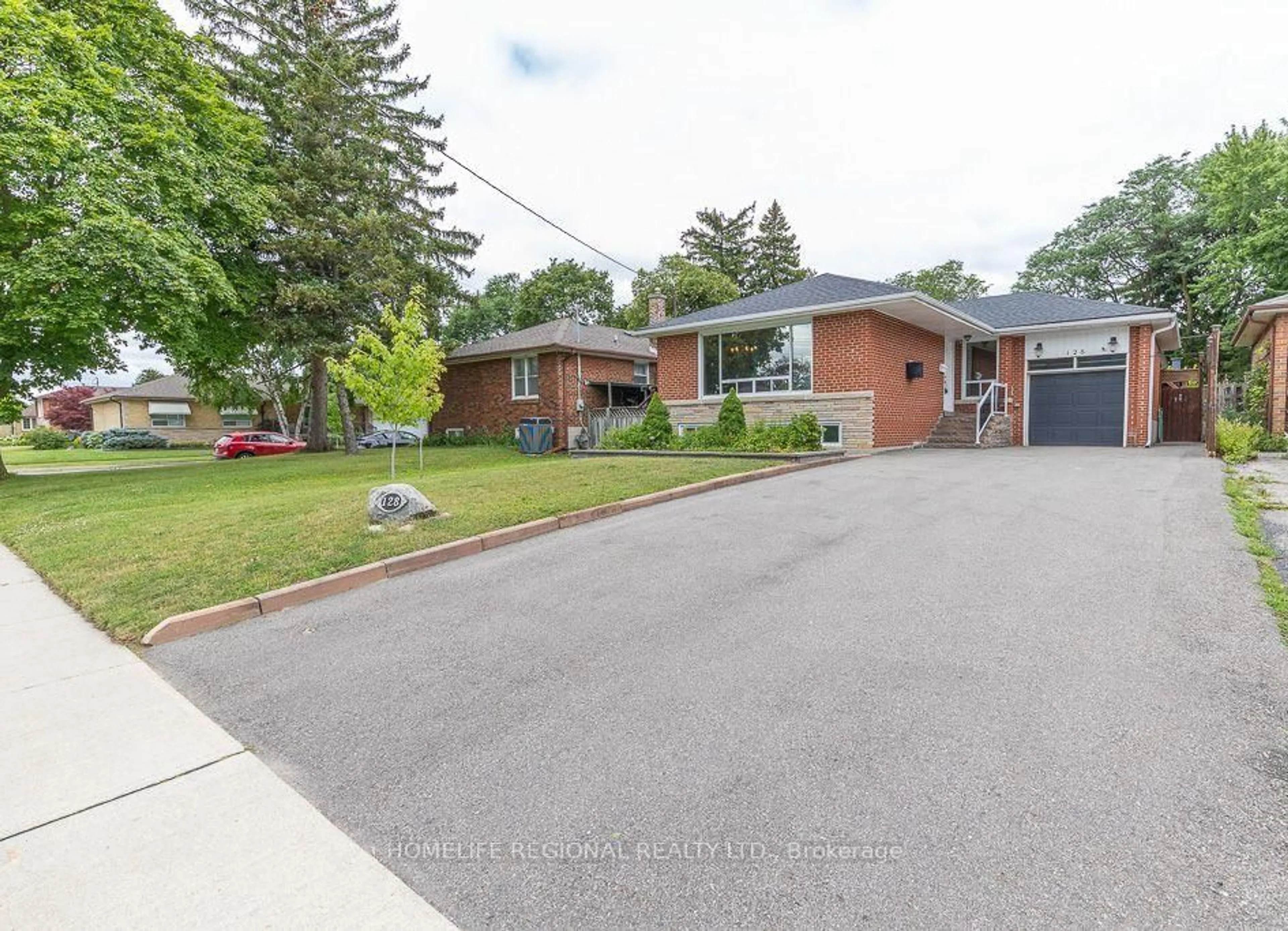 Home with brick exterior material, street for 128 The Westway, Toronto Ontario M9P 2B9