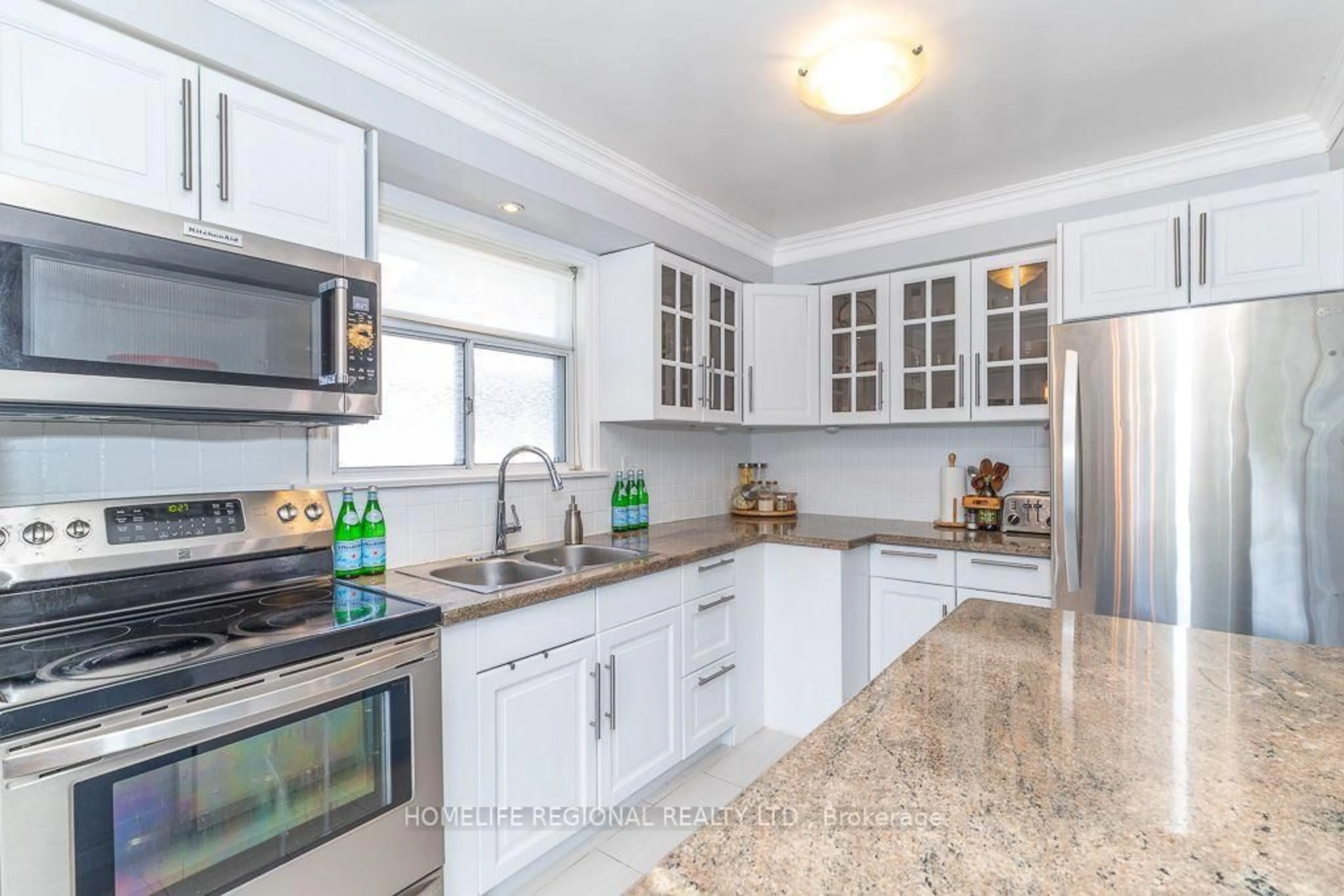 Open concept kitchen, ceramic/tile floor for 128 The Westway, Toronto Ontario M9P 2B9