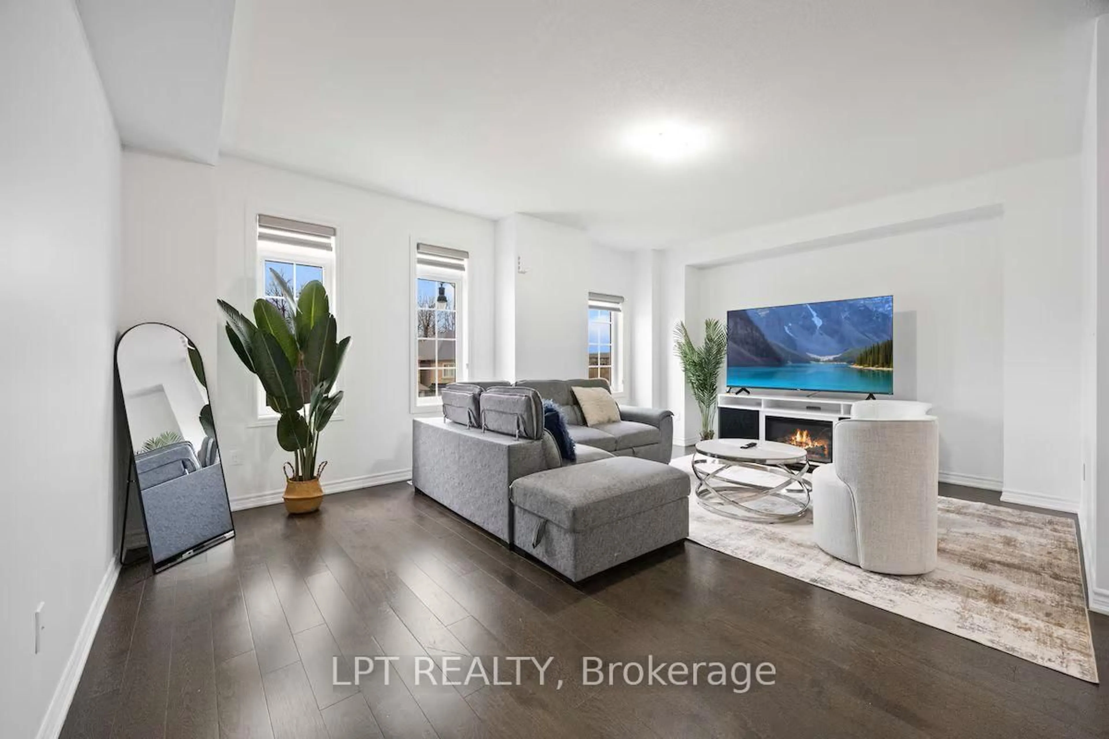 Living room with furniture, unknown for 341 Remembrance Rd, Brampton Ontario L7A 4X5