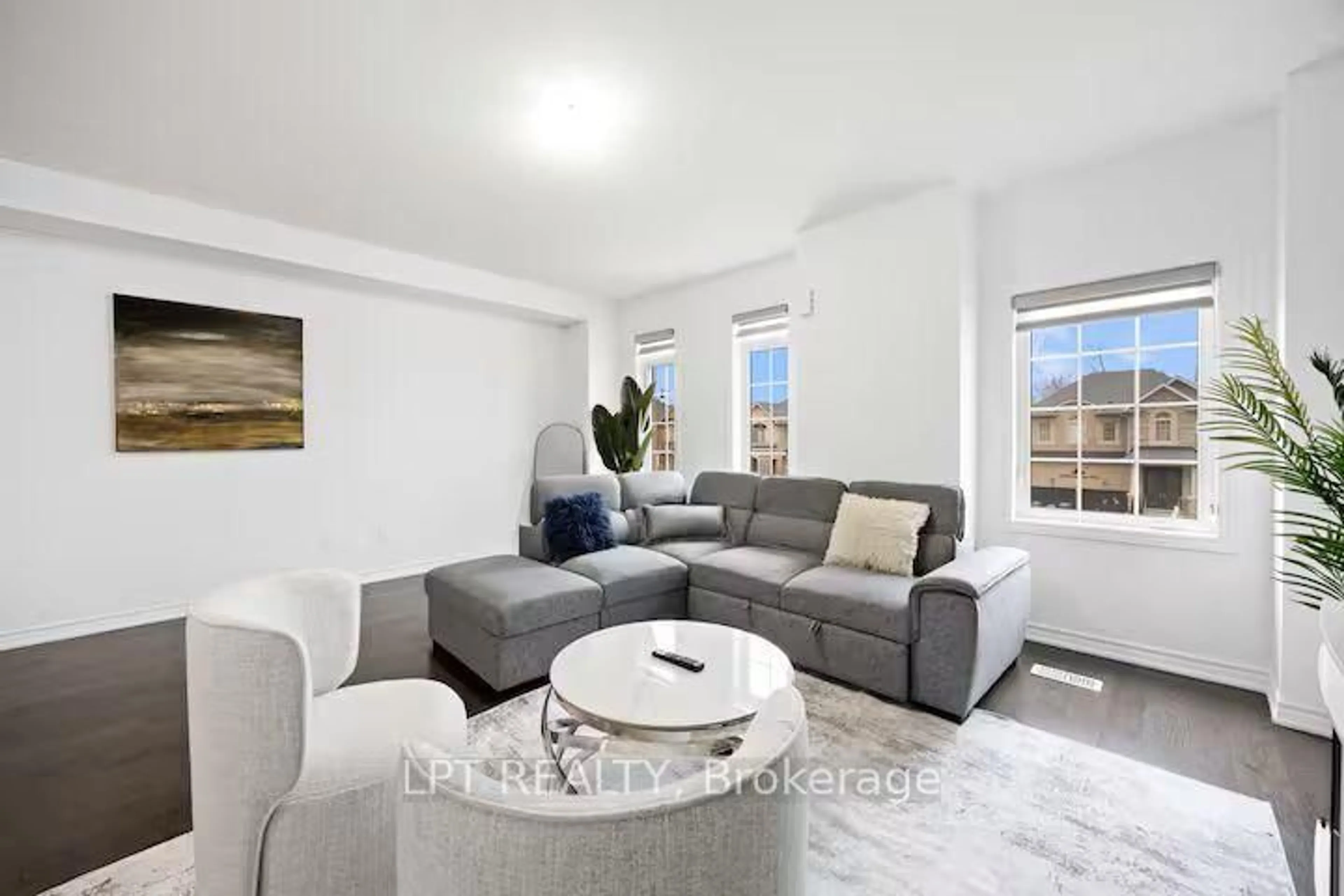 Living room with furniture, unknown for 341 Remembrance Rd, Brampton Ontario L7A 4X5