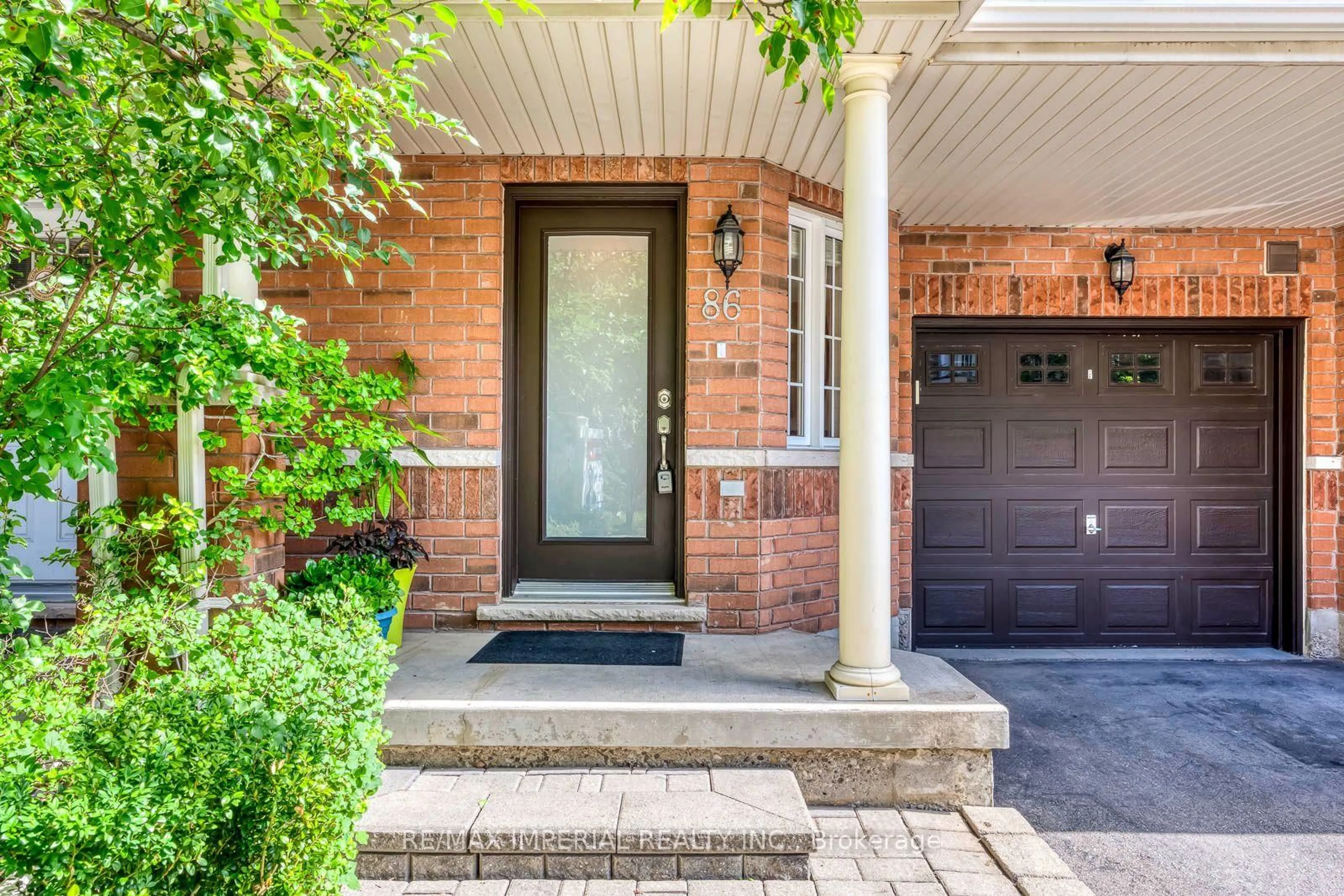 Home with brick exterior material, street for 620 Ferguson Dr #86, Milton Ontario L9T 0M8