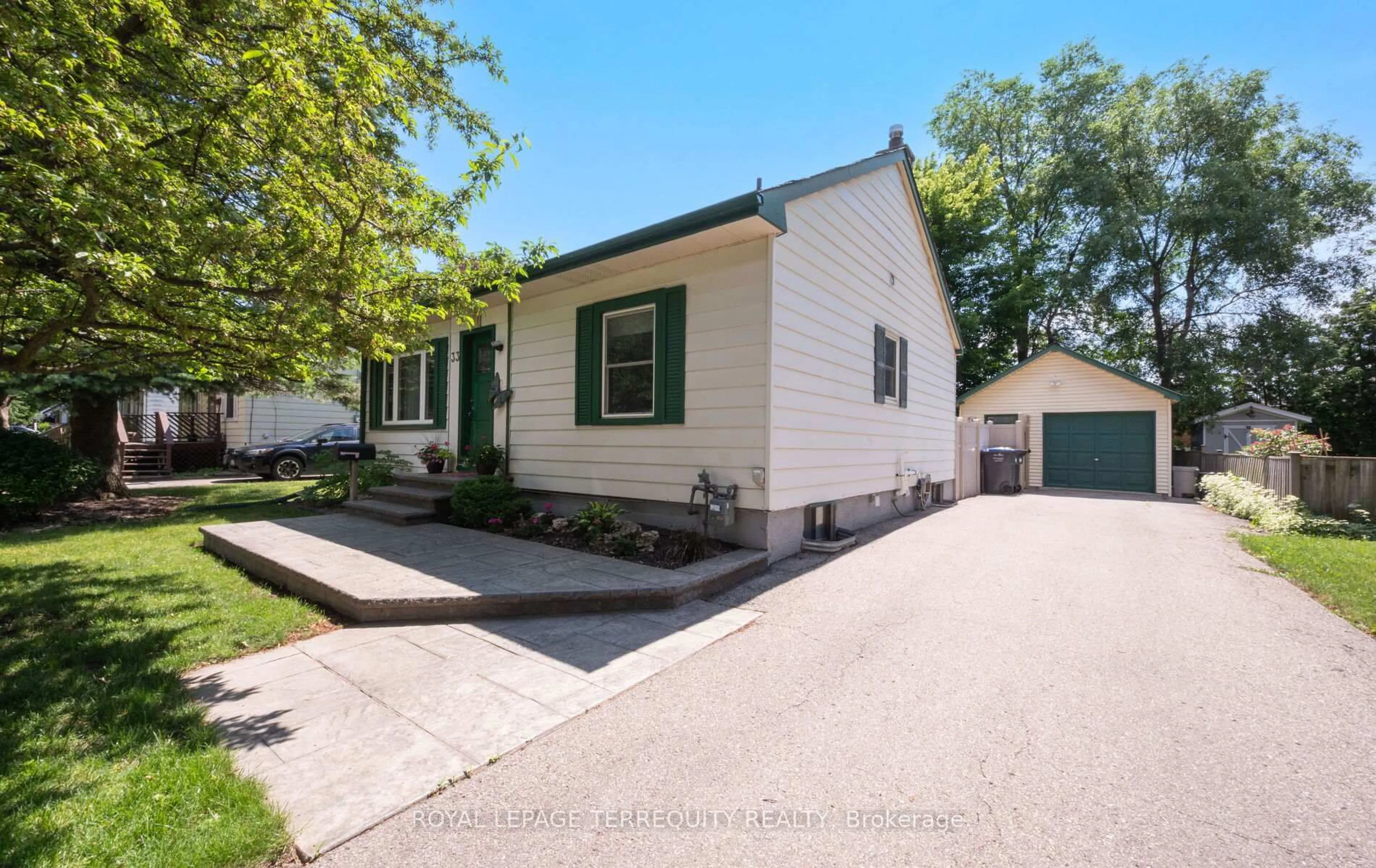 Home with vinyl exterior material, street for 33 Rogers Rd, Brampton Ontario L6X 1L7