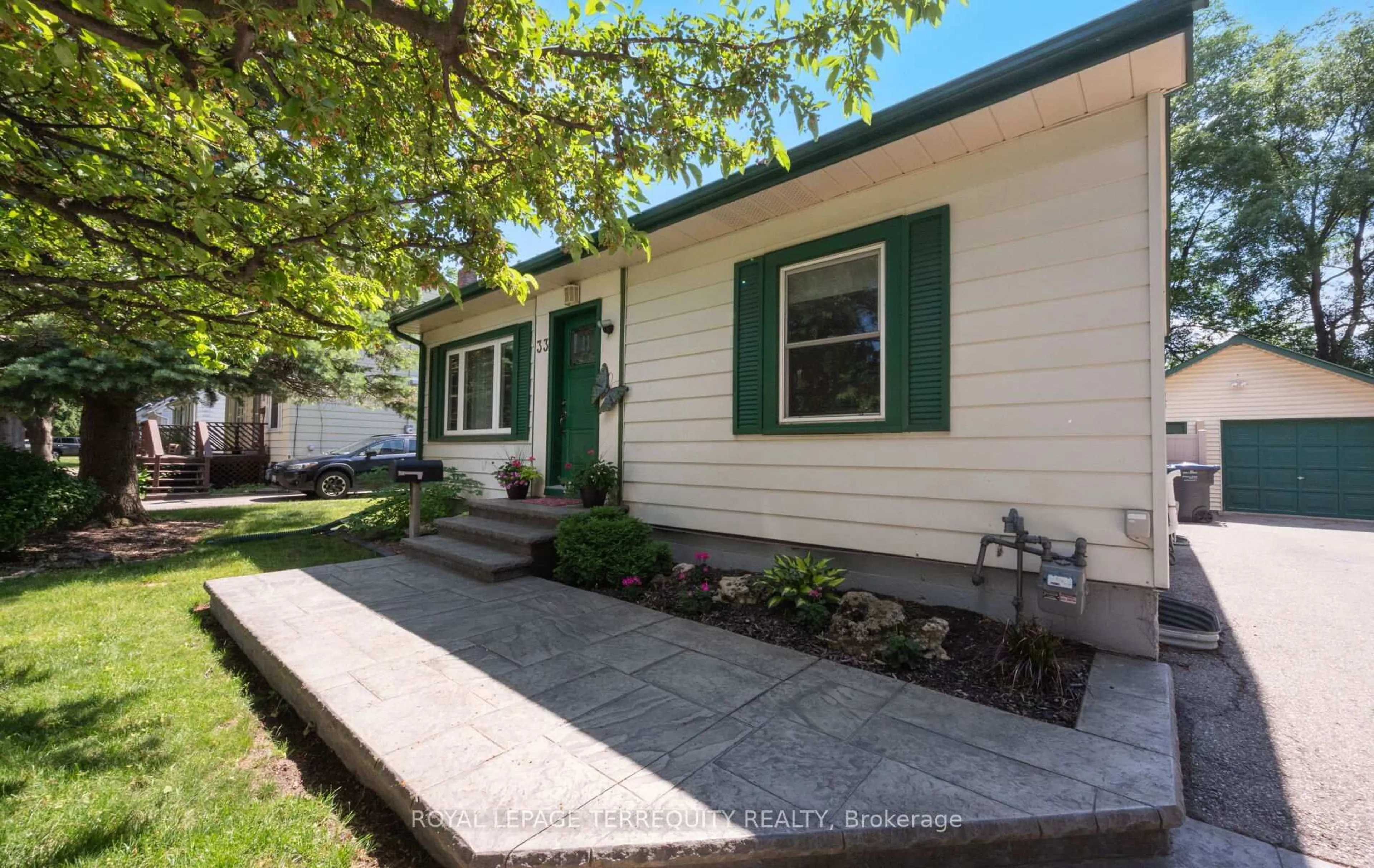 Home with vinyl exterior material, street for 33 Rogers Rd, Brampton Ontario L6X 1L7