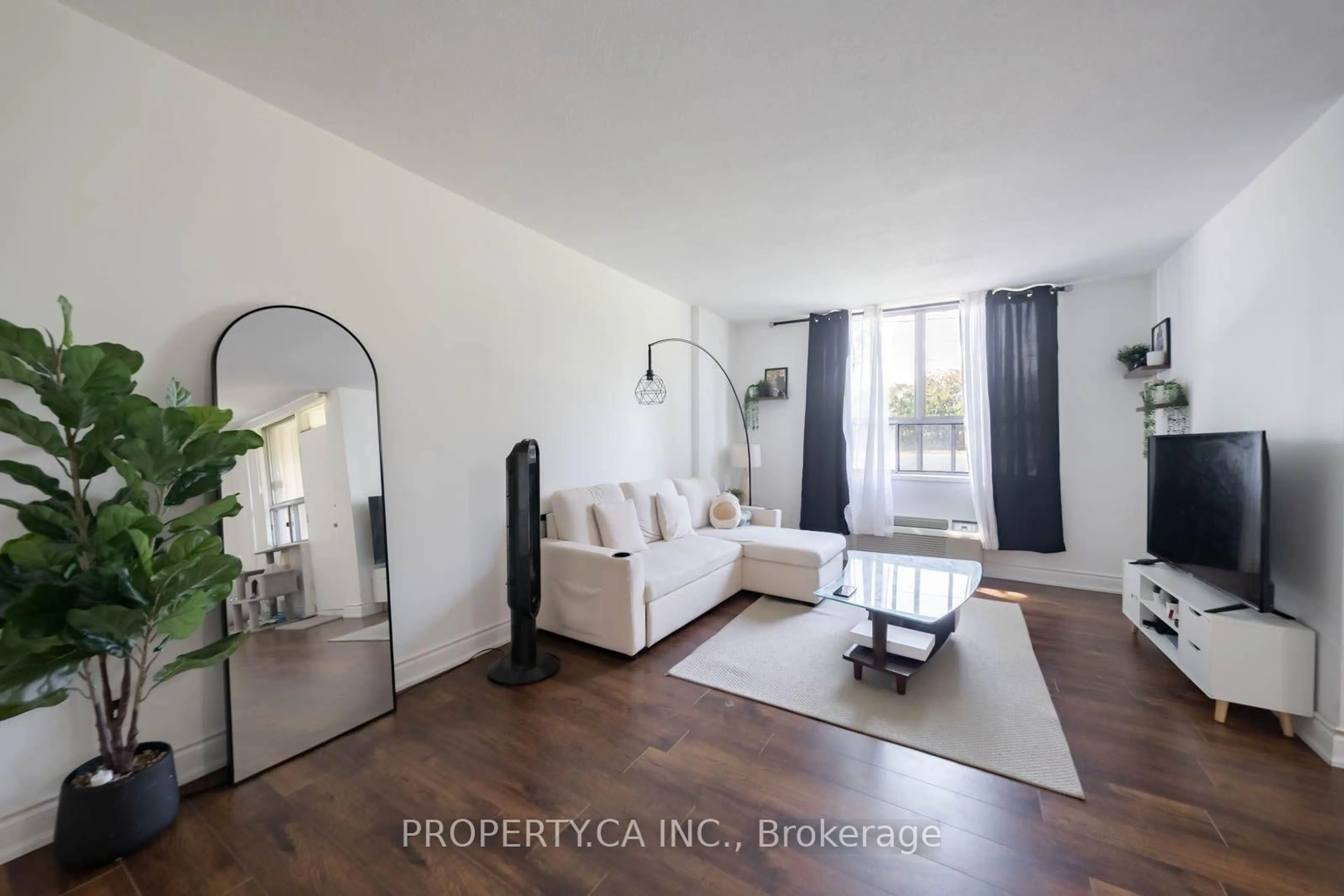 Living room with furniture, unknown for 2835 Islington Ave #107, Toronto Ontario M9L 2K2