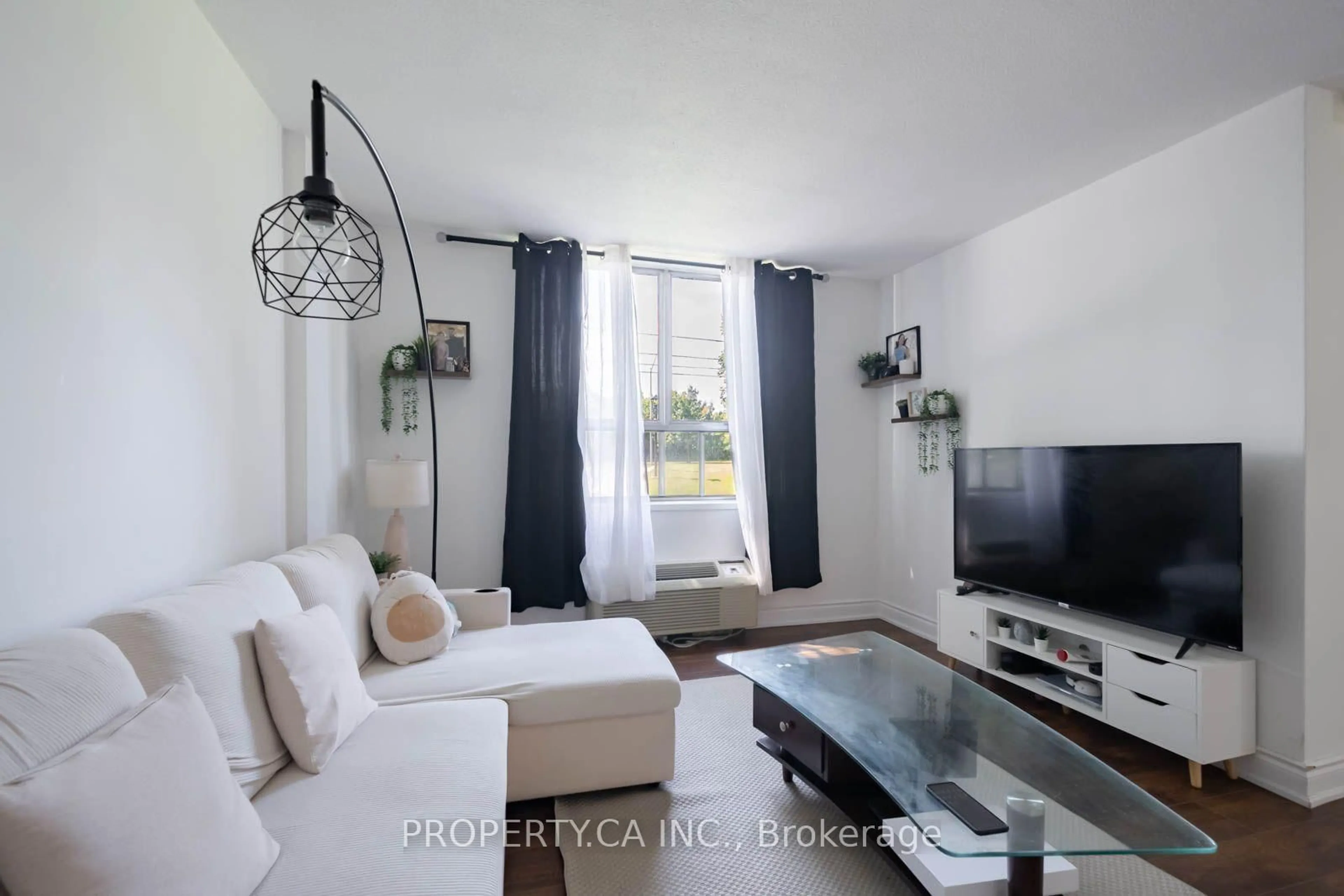 Living room with furniture, unknown for 2835 Islington Ave #107, Toronto Ontario M9L 2K2