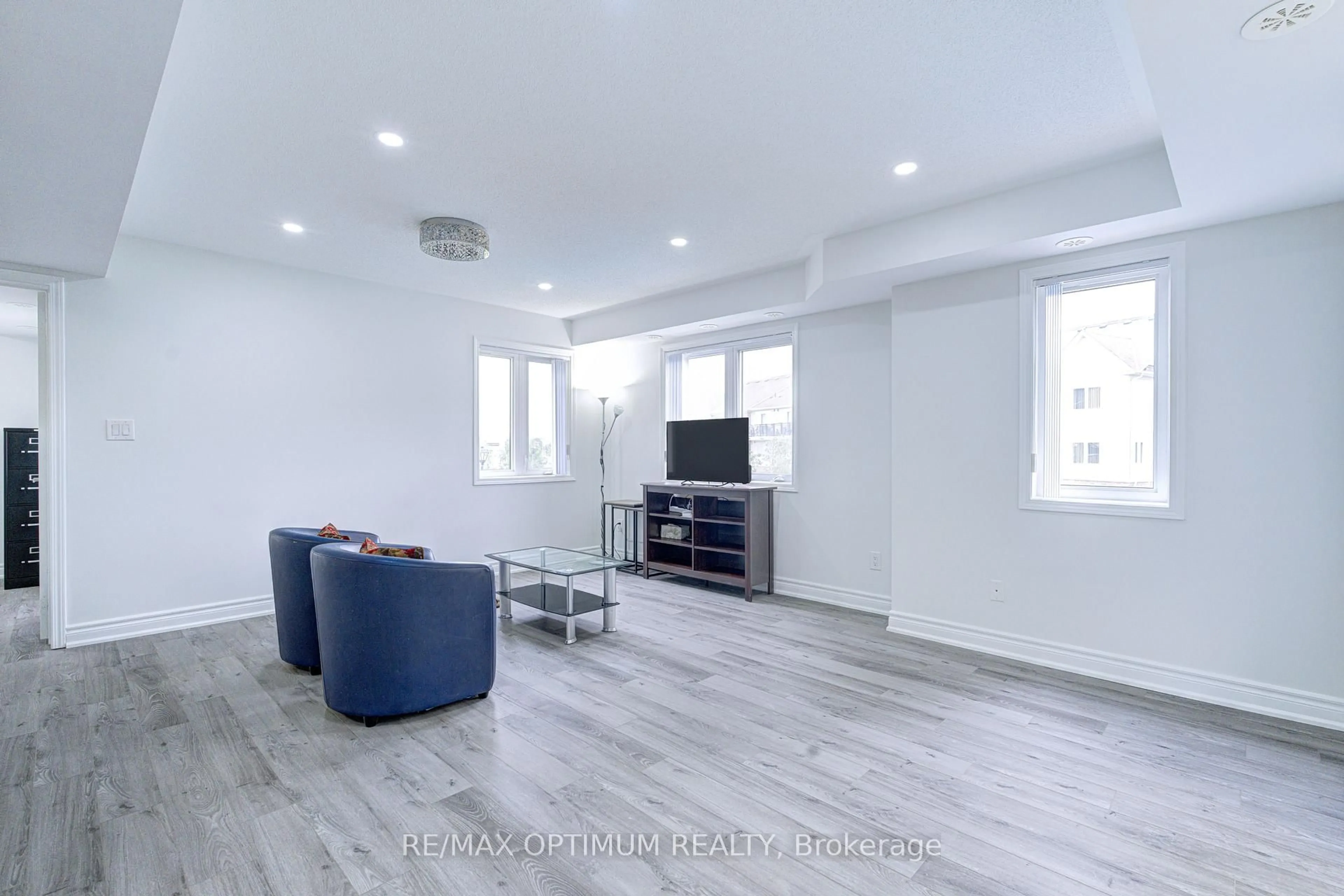 Living room with furniture, wood/laminate floor for 250 Sunny Meadow Blvd #303, Brampton Ontario L6R 3Y6