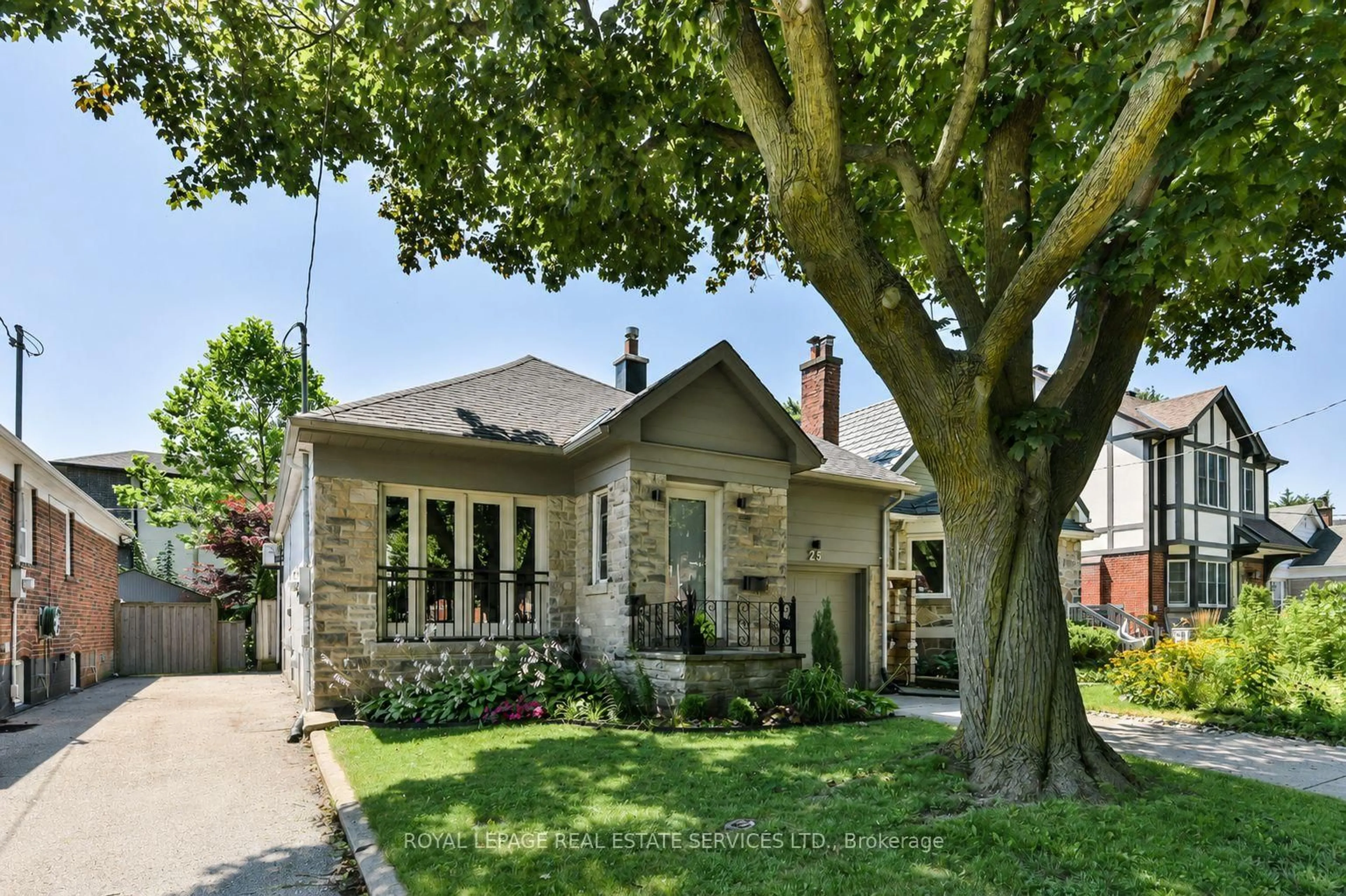 Home with brick exterior material, street for 25 Miles Rd, Toronto Ontario M8V 1V4