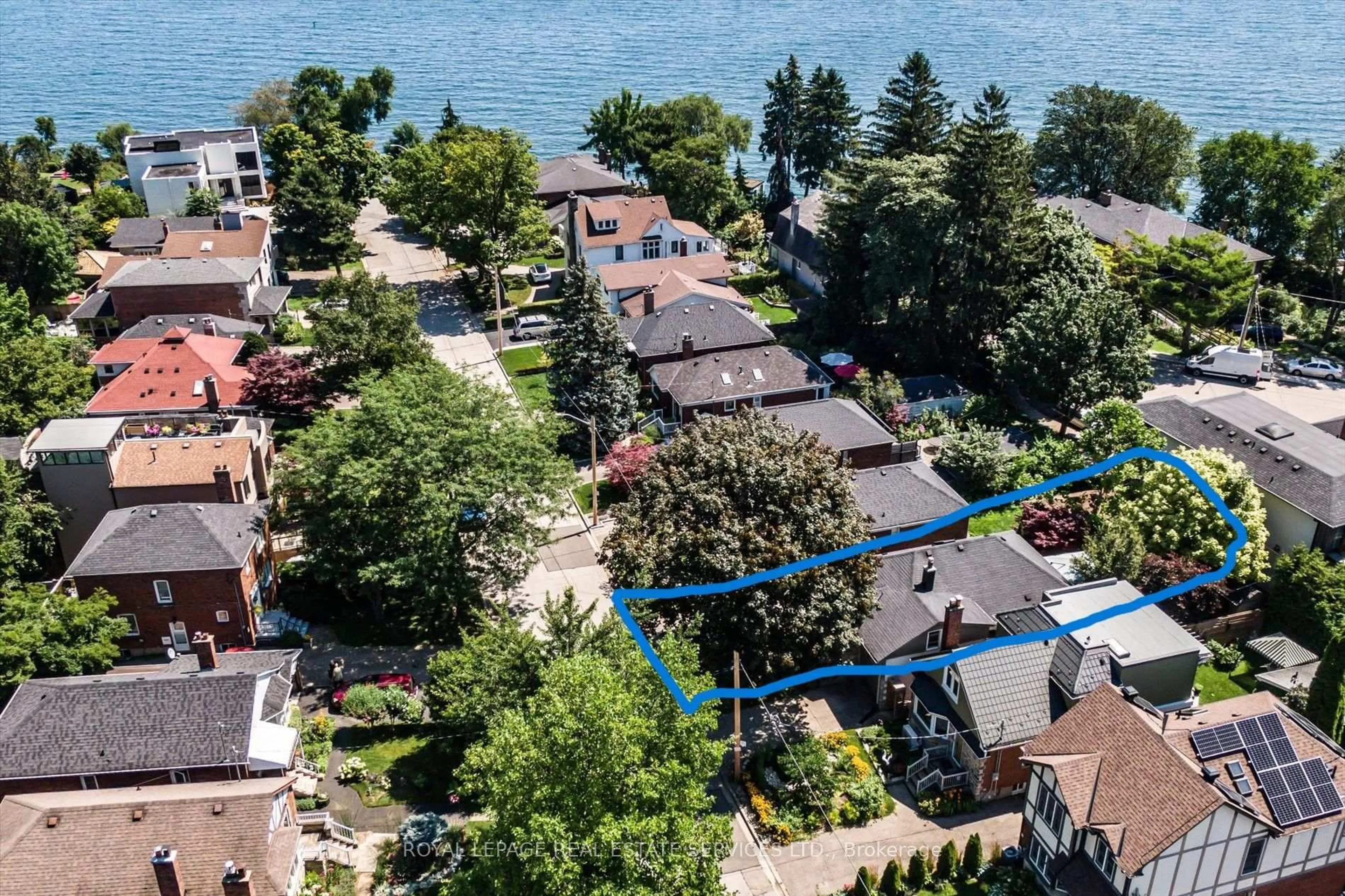 A pic from outside/outdoor area/front of a property/back of a property/a pic from drone, water/lake/river/ocean view for 25 Miles Rd, Toronto Ontario M8V 1V4