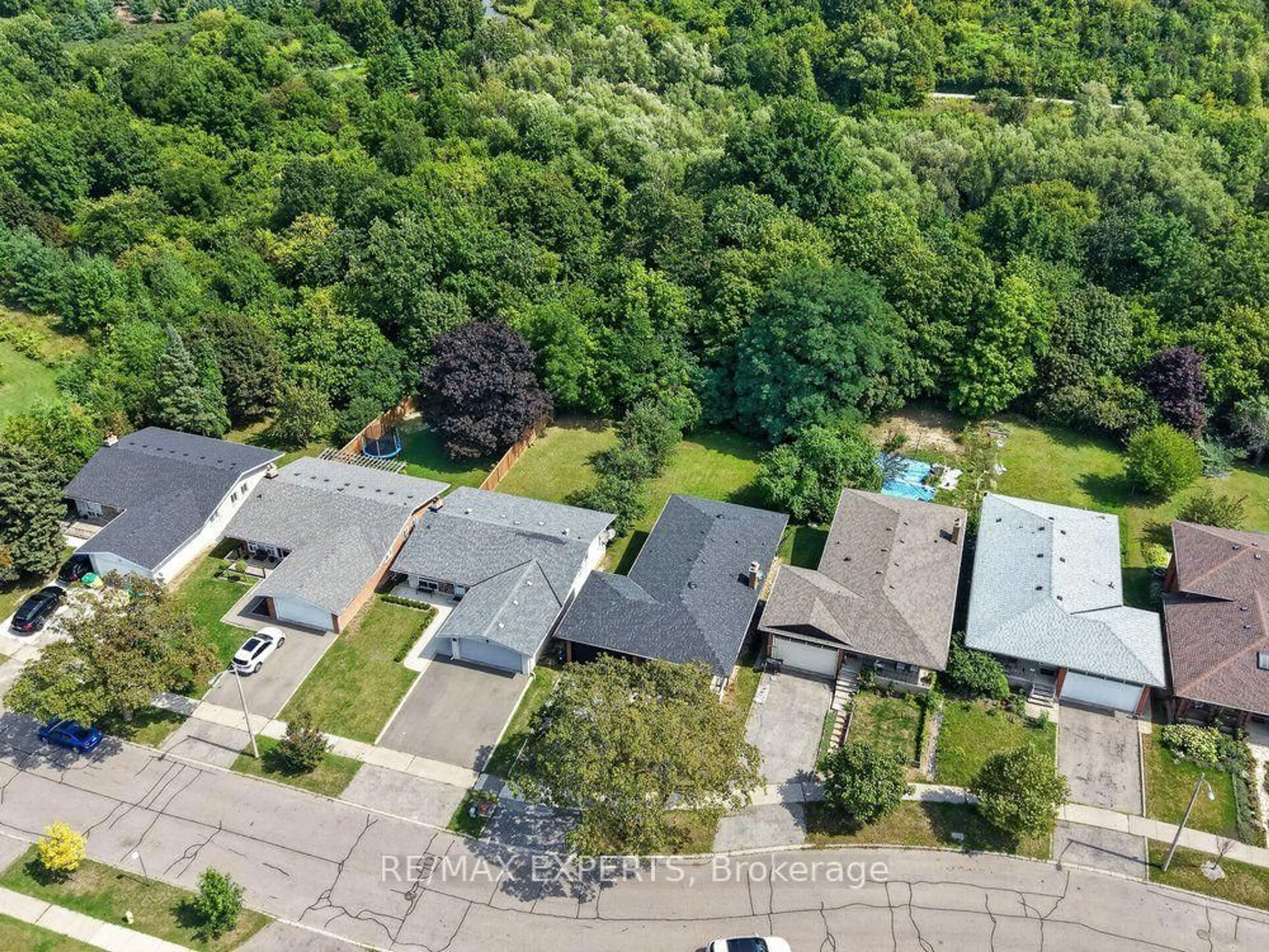 A pic from outside/outdoor area/front of a property/back of a property/a pic from drone, street for 23 Collingdale Rd, Toronto Ontario M9V 3R2