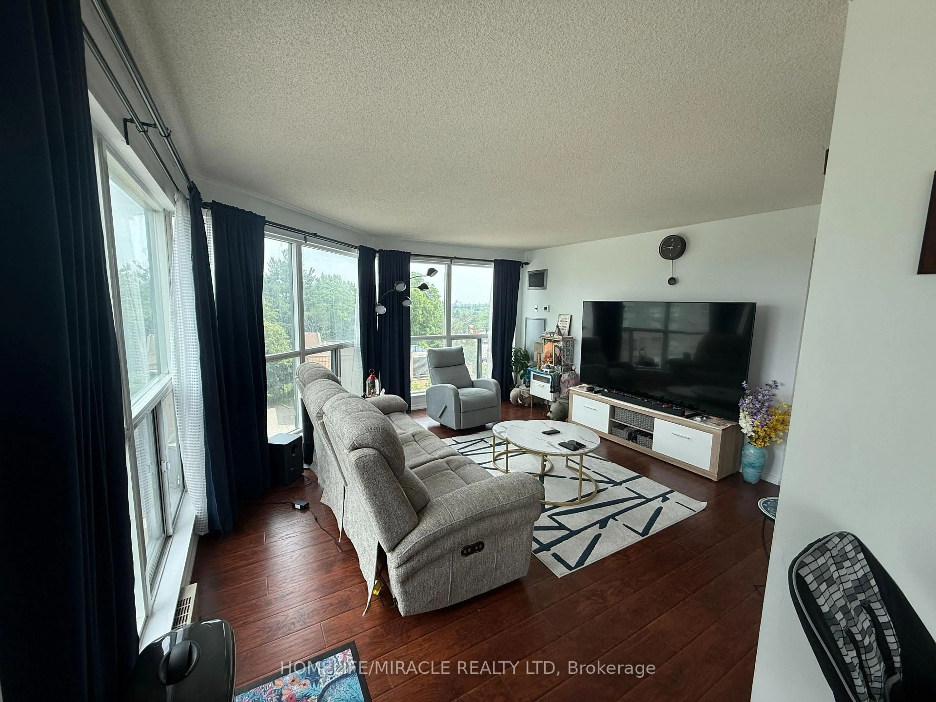 Living room with furniture, unknown for 2177 Burnhamthorpe Rd #609, Mississauga Ontario L5L 5P9