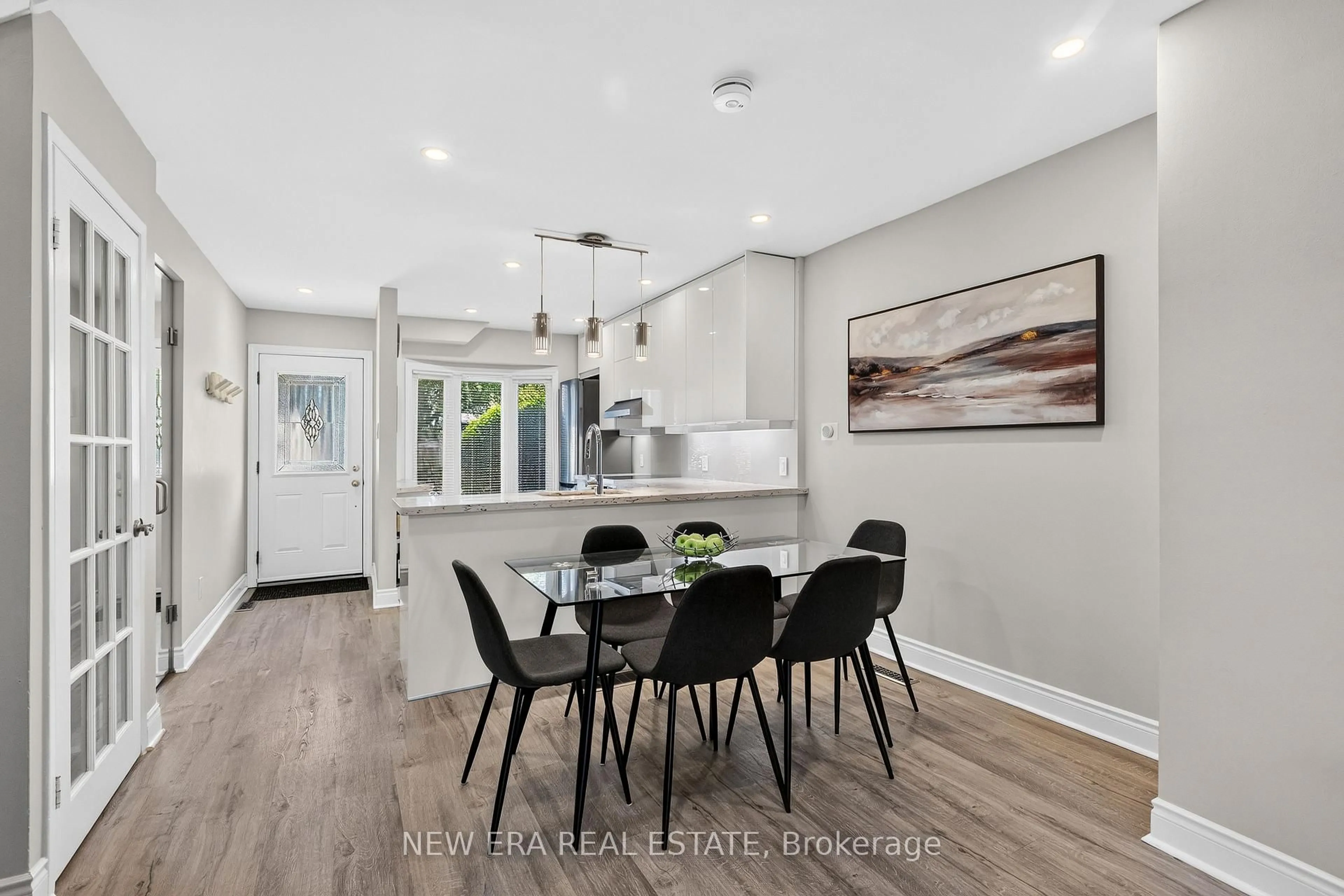 Open concept kitchen, wood/laminate floor for 5020 Delaware Dr #51, Mississauga Ontario L4Z 3C3