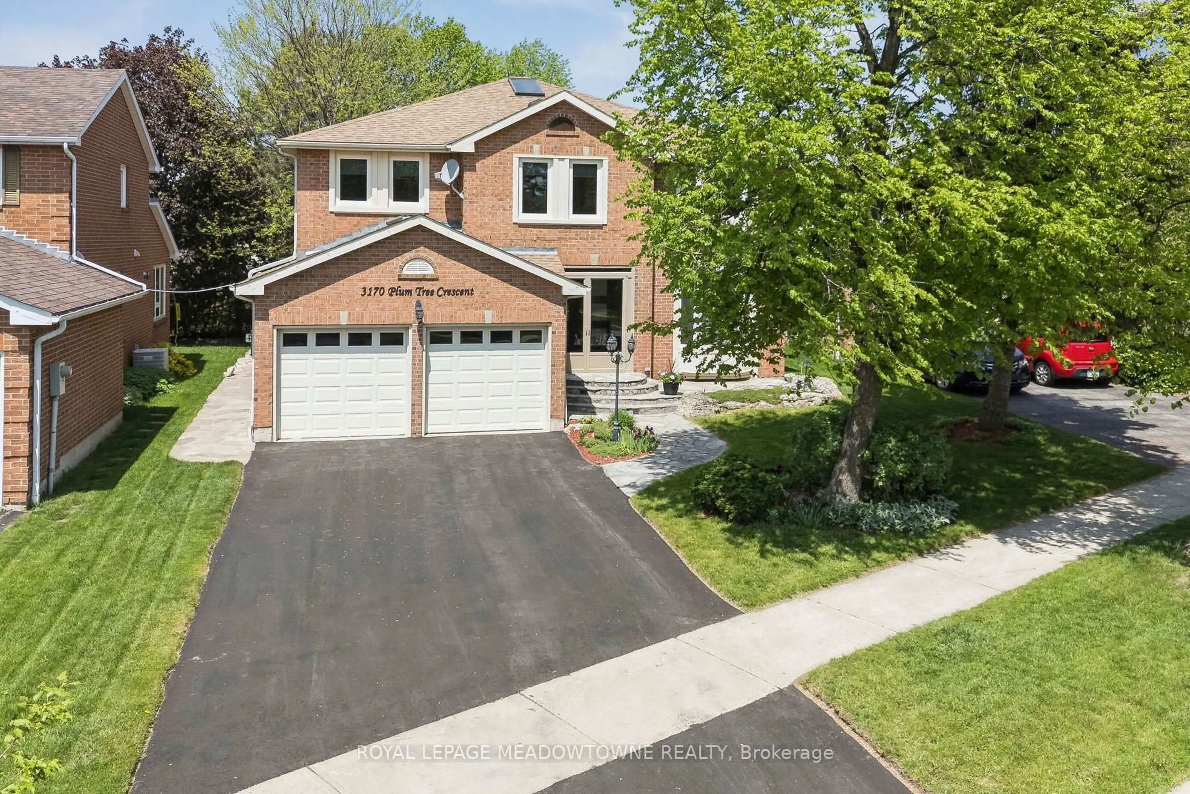 Home with brick exterior material, street for 3170 Plum Tree Cres, Mississauga Ontario L5N 4X3