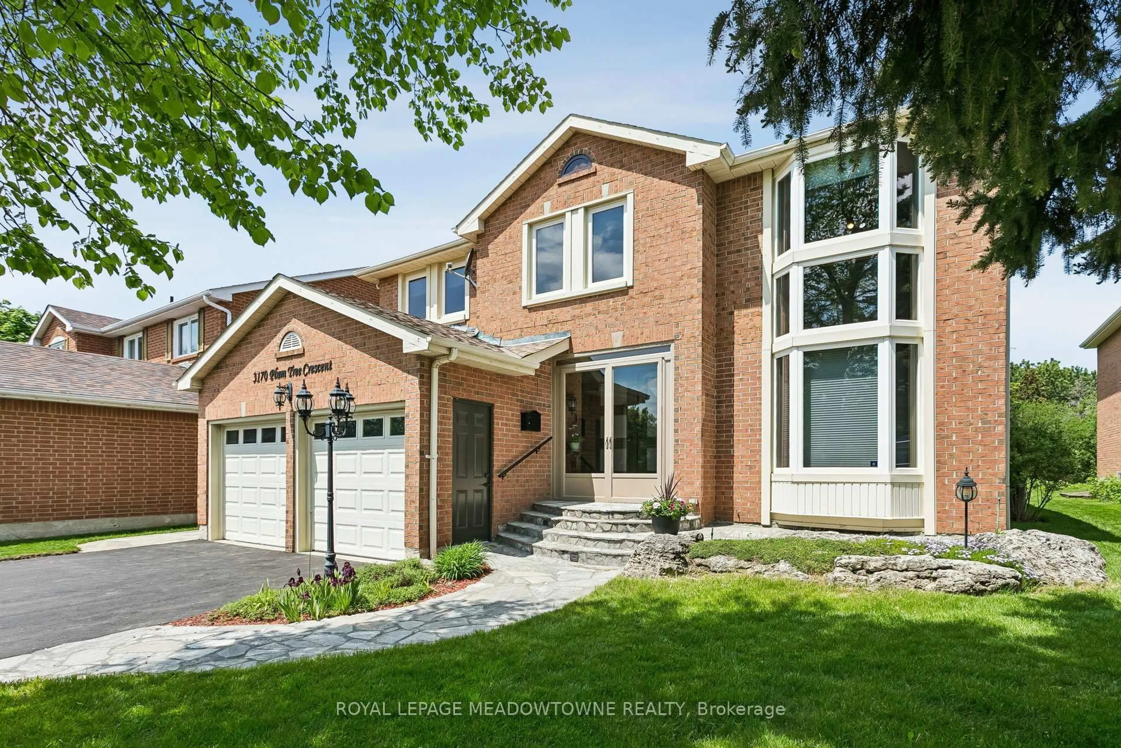Home with brick exterior material, street for 3170 Plum Tree Cres, Mississauga Ontario L5N 4X3