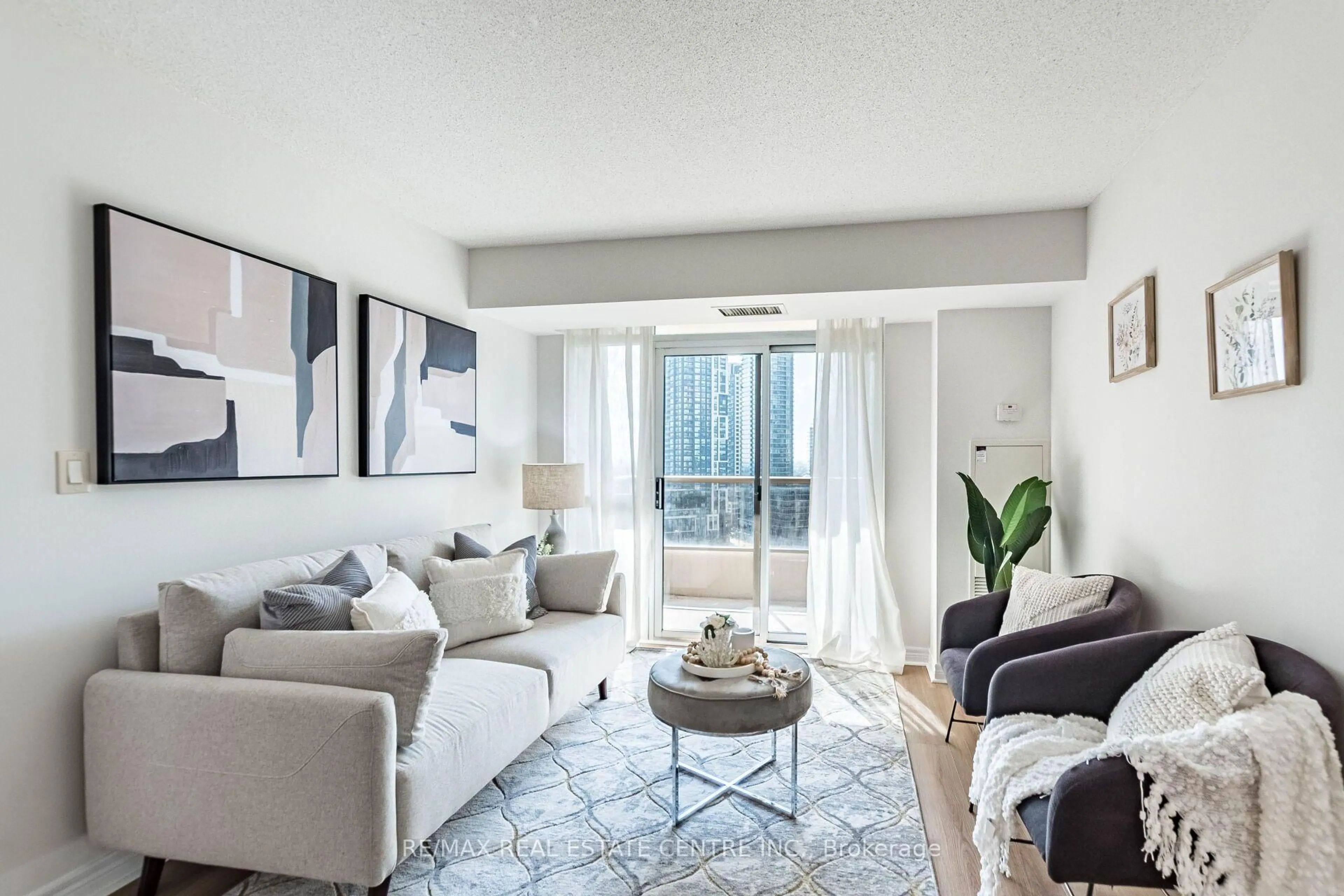 Living room with furniture, unknown for 310 Burnhamthorpe Rd #1701, Mississauga Ontario L5B 4P9
