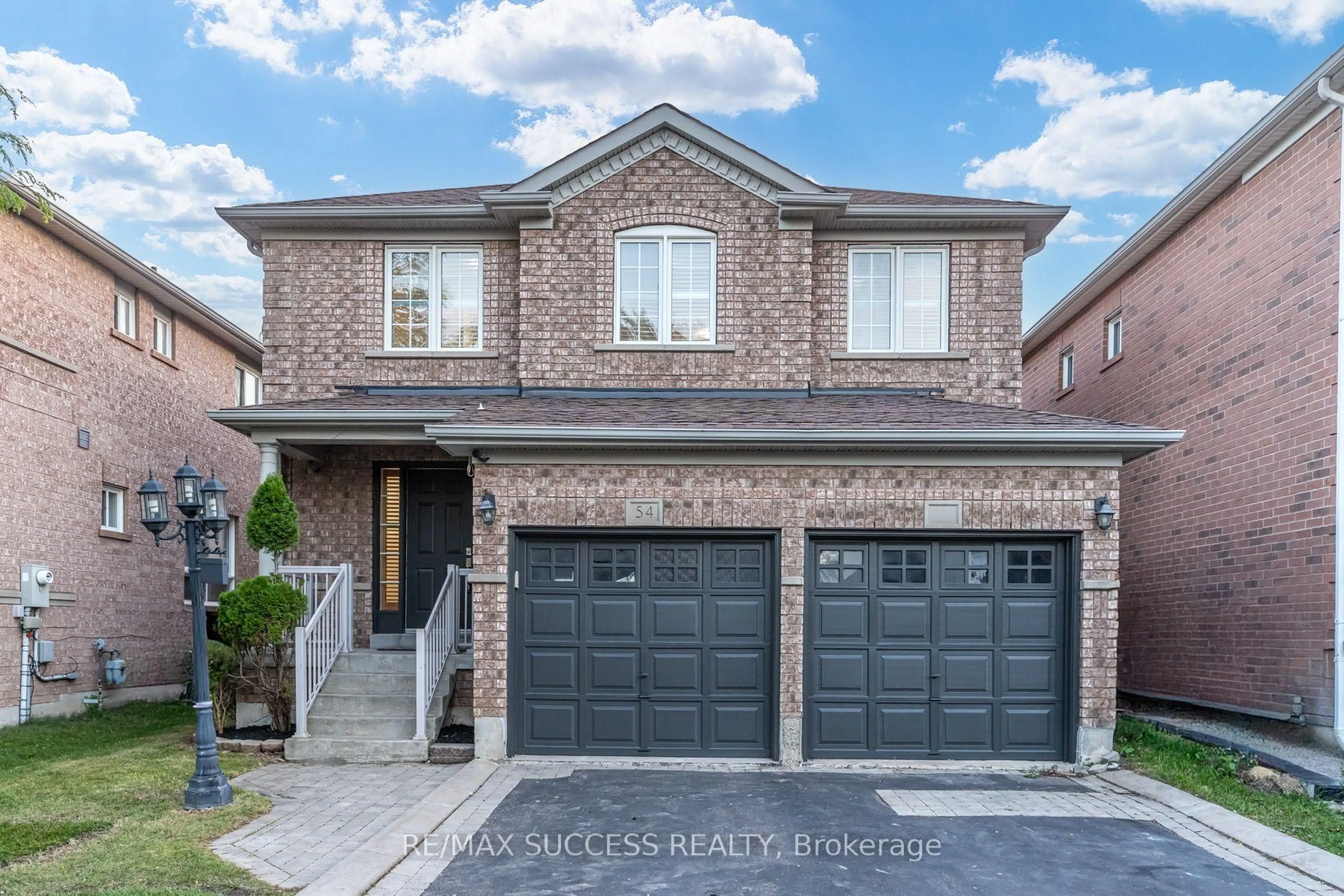 Home with brick exterior material, street for 54 Ferncroft Pl, Brampton Ontario L7A 3C8