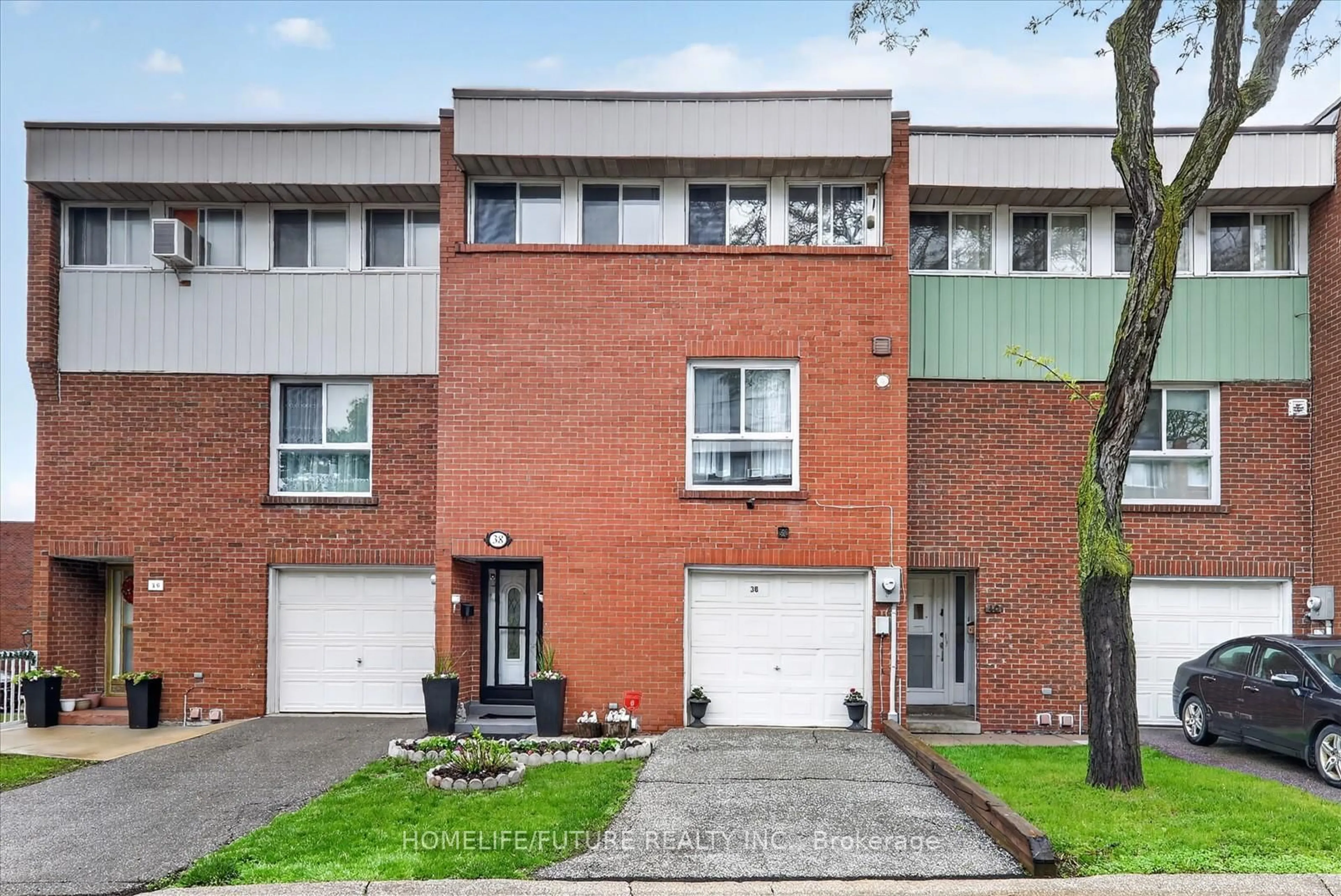 Home with brick exterior material, street for 38 John Cabot Way #70, Toronto Ontario M3N 2T7
