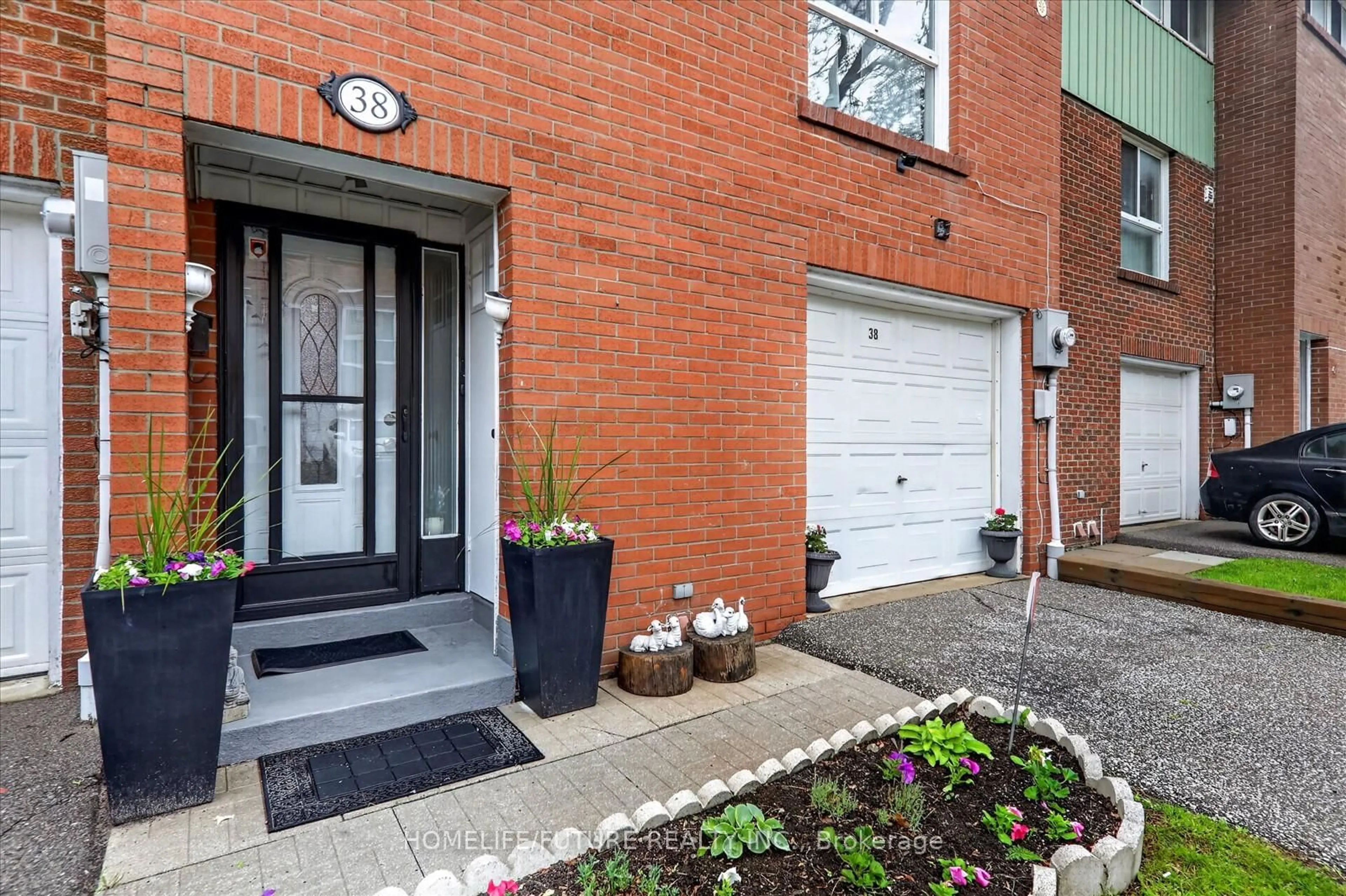 Home with brick exterior material, street for 38 John Cabot Way #70, Toronto Ontario M3N 2T7