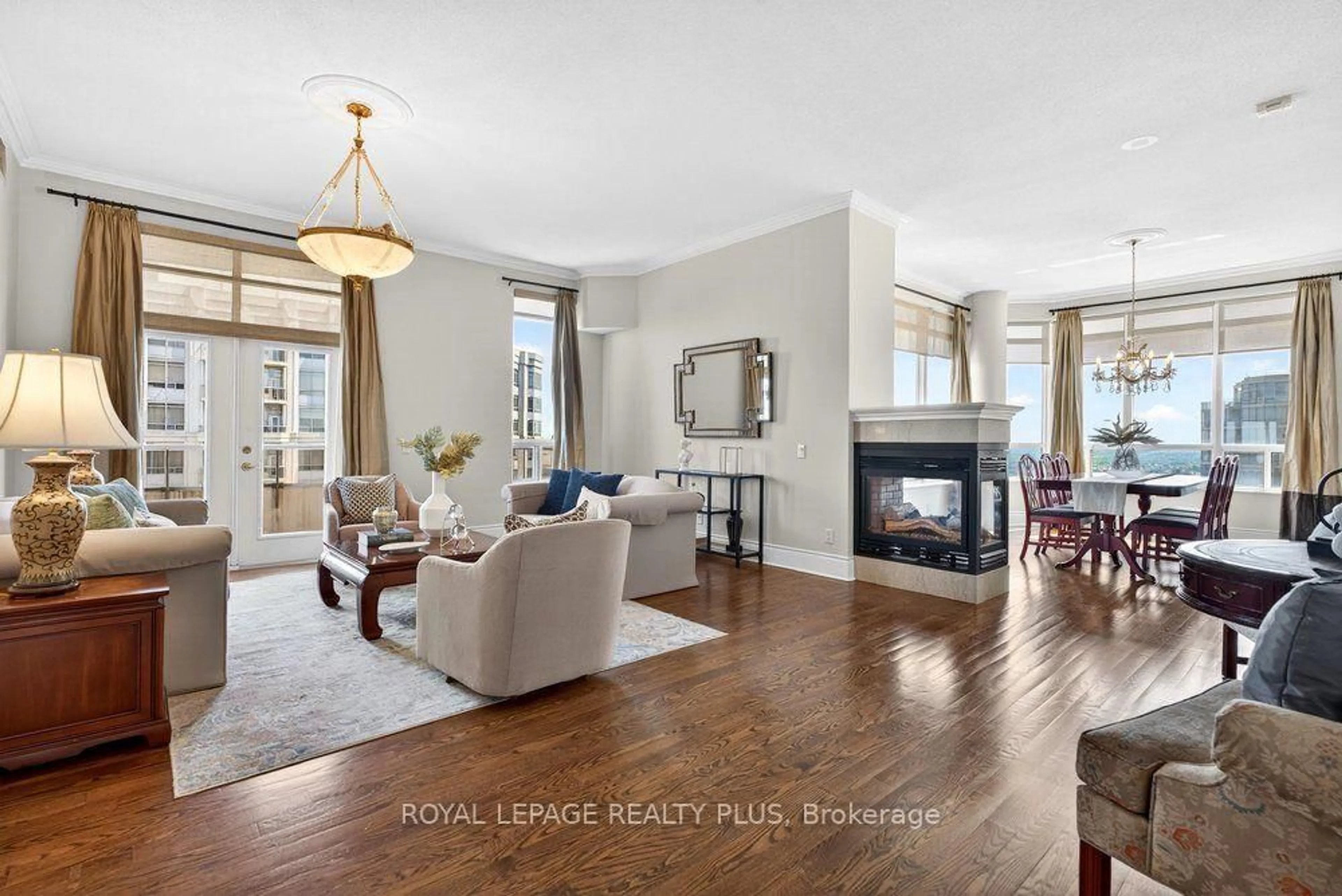 Living room with furniture, unknown for 35 Kingsbridge Garden Circ #TPH4, Mississauga Ontario L5R 3Z5