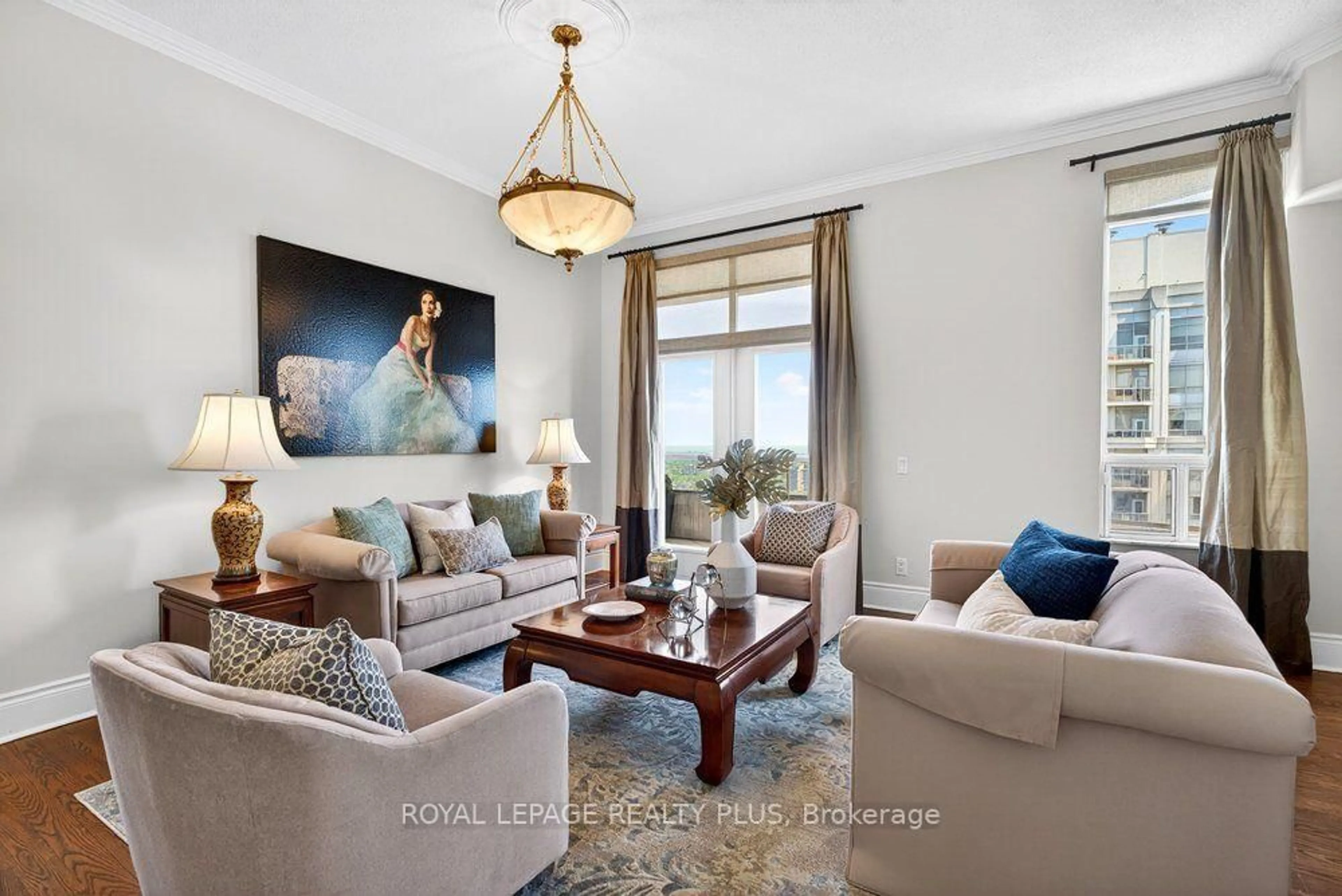 Living room with furniture, unknown for 35 Kingsbridge Garden Circ #TPH4, Mississauga Ontario L5R 3Z5