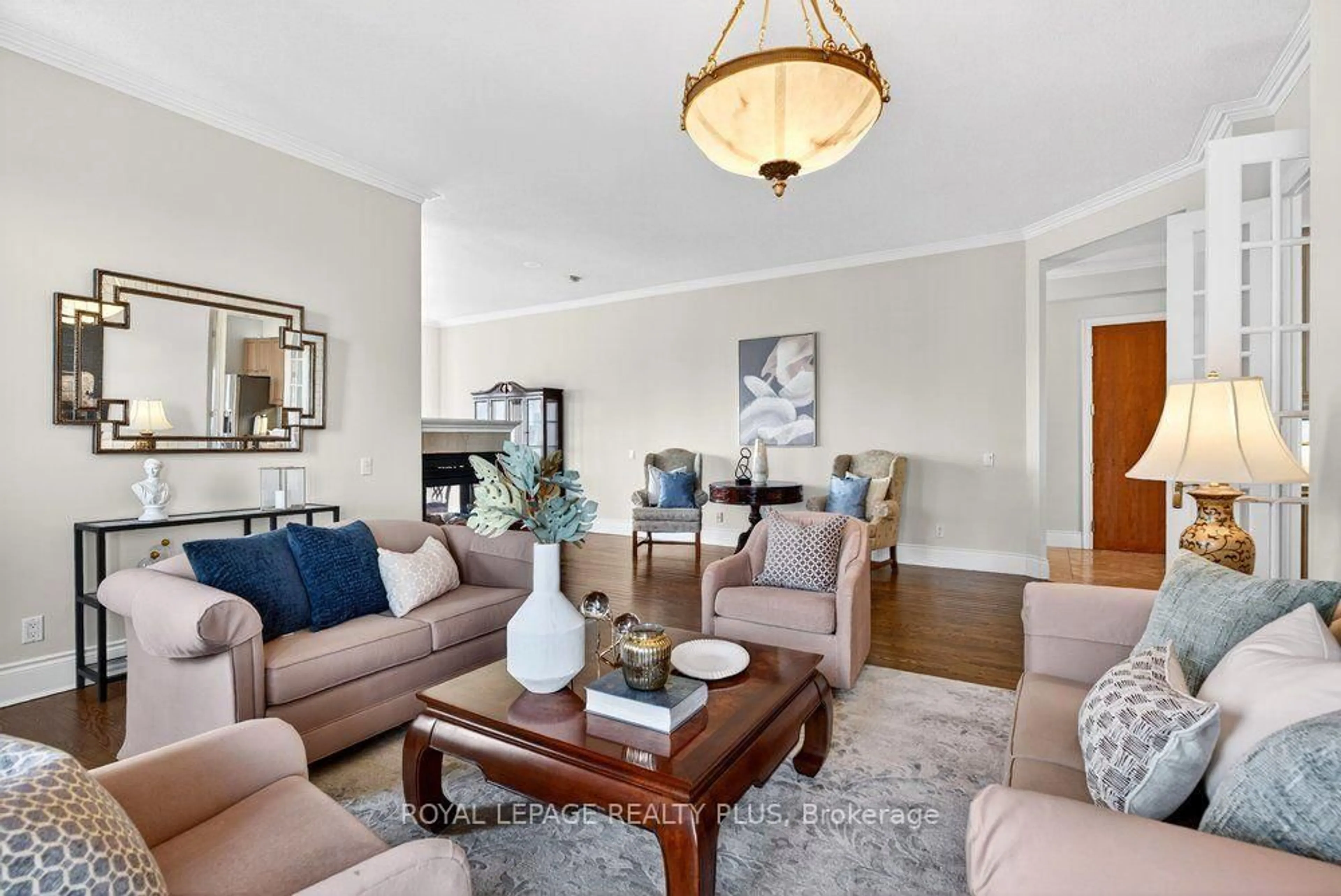 Living room with furniture, unknown for 35 Kingsbridge Garden Circ #TPH4, Mississauga Ontario L5R 3Z5
