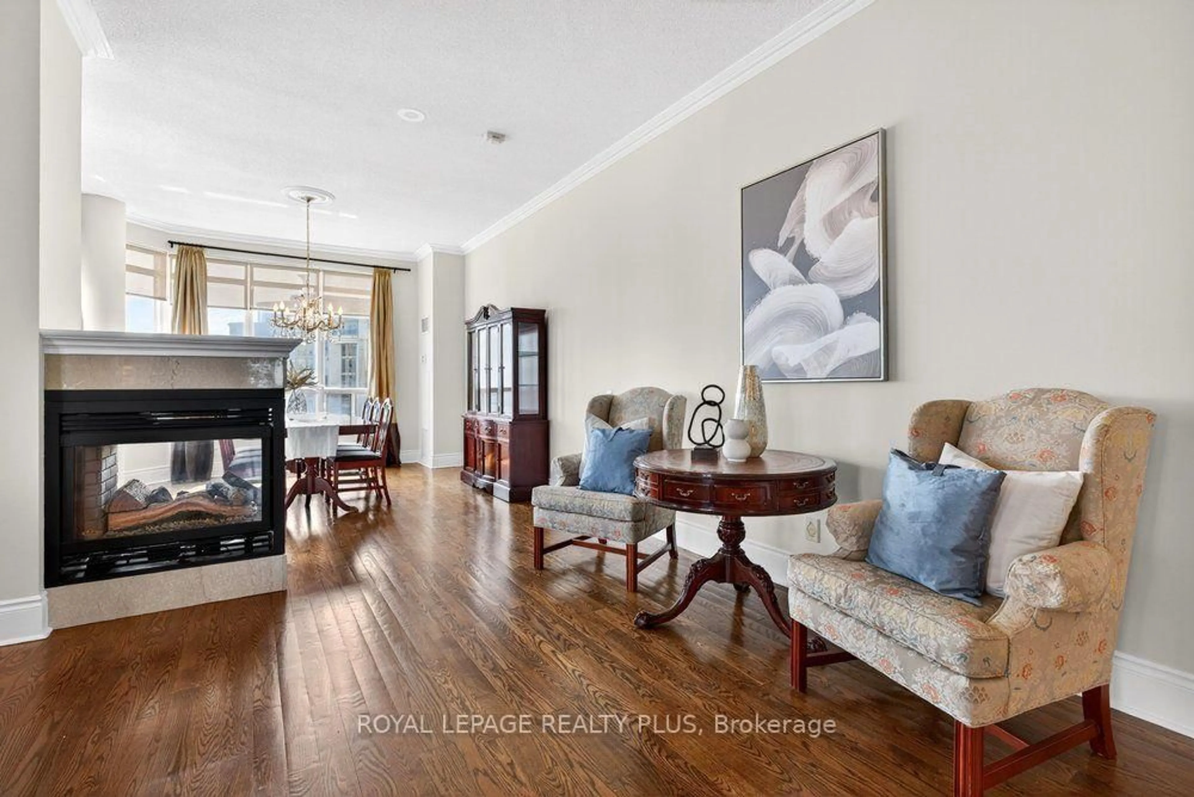 Living room with furniture, unknown for 35 Kingsbridge Garden Circ #TPH4, Mississauga Ontario L5R 3Z5