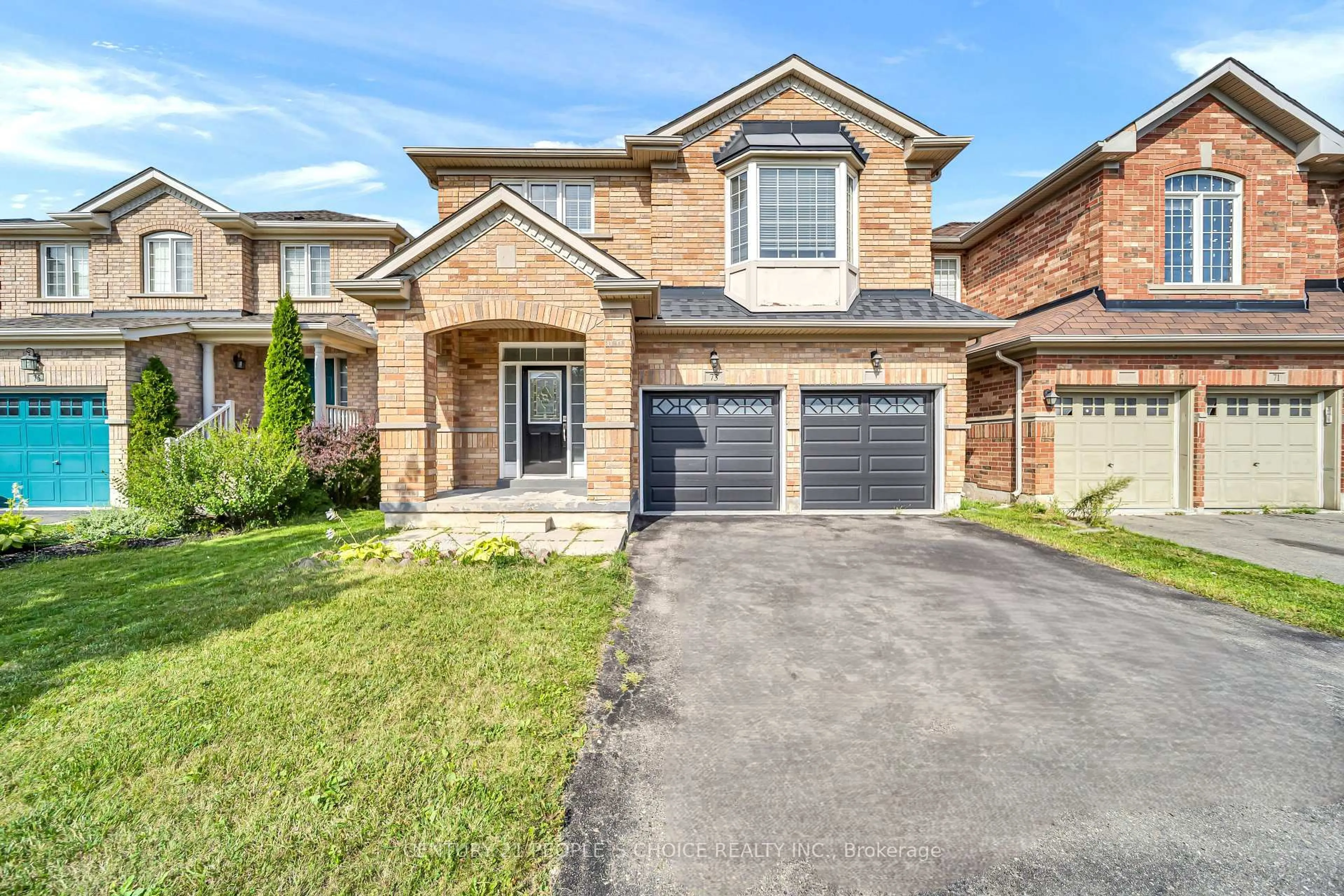 Home with brick exterior material, street for 73 Crown Victoria Dr, Brampton Ontario L7A 3X1