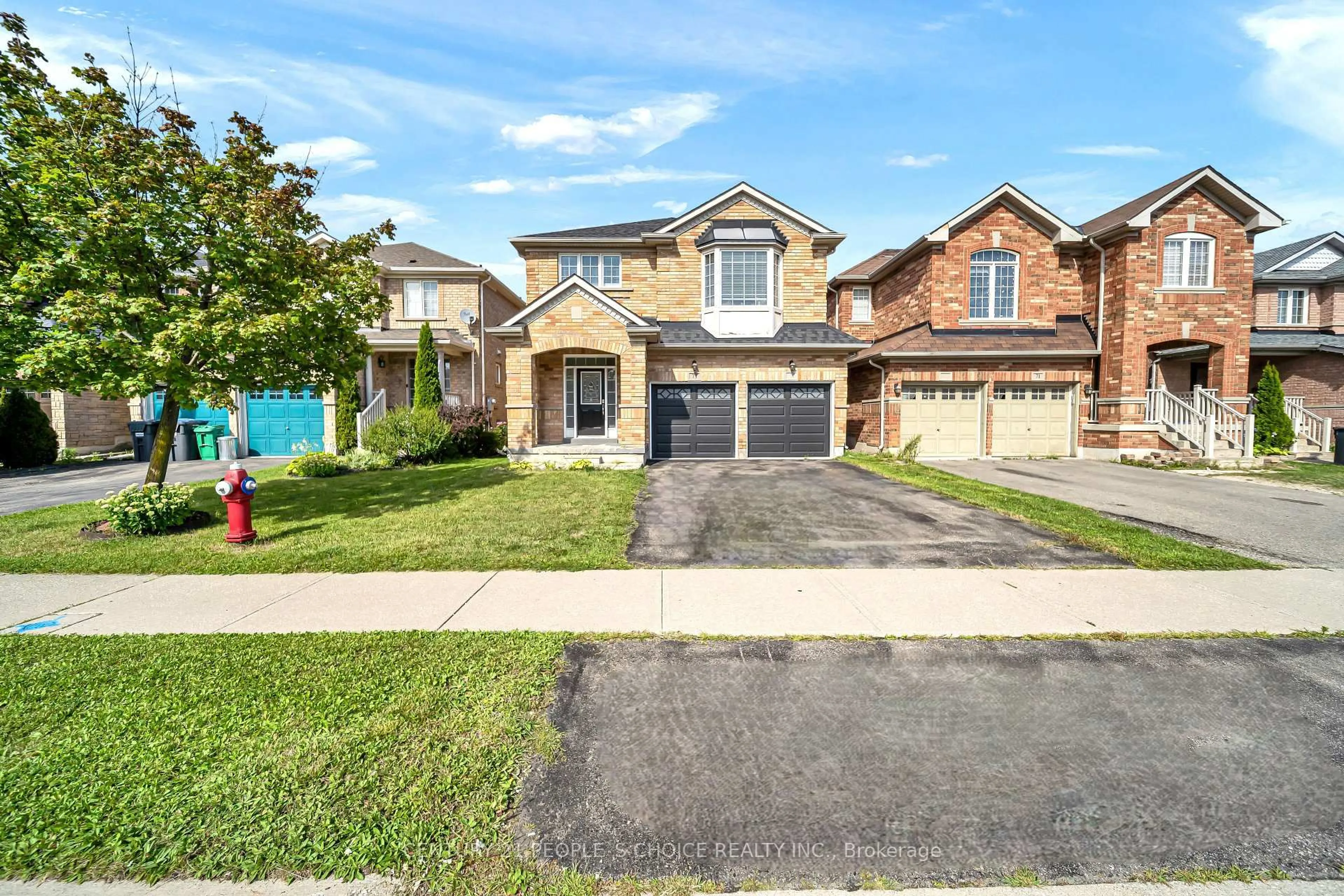Home with brick exterior material, street for 73 Crown Victoria Dr, Brampton Ontario L7A 3X1
