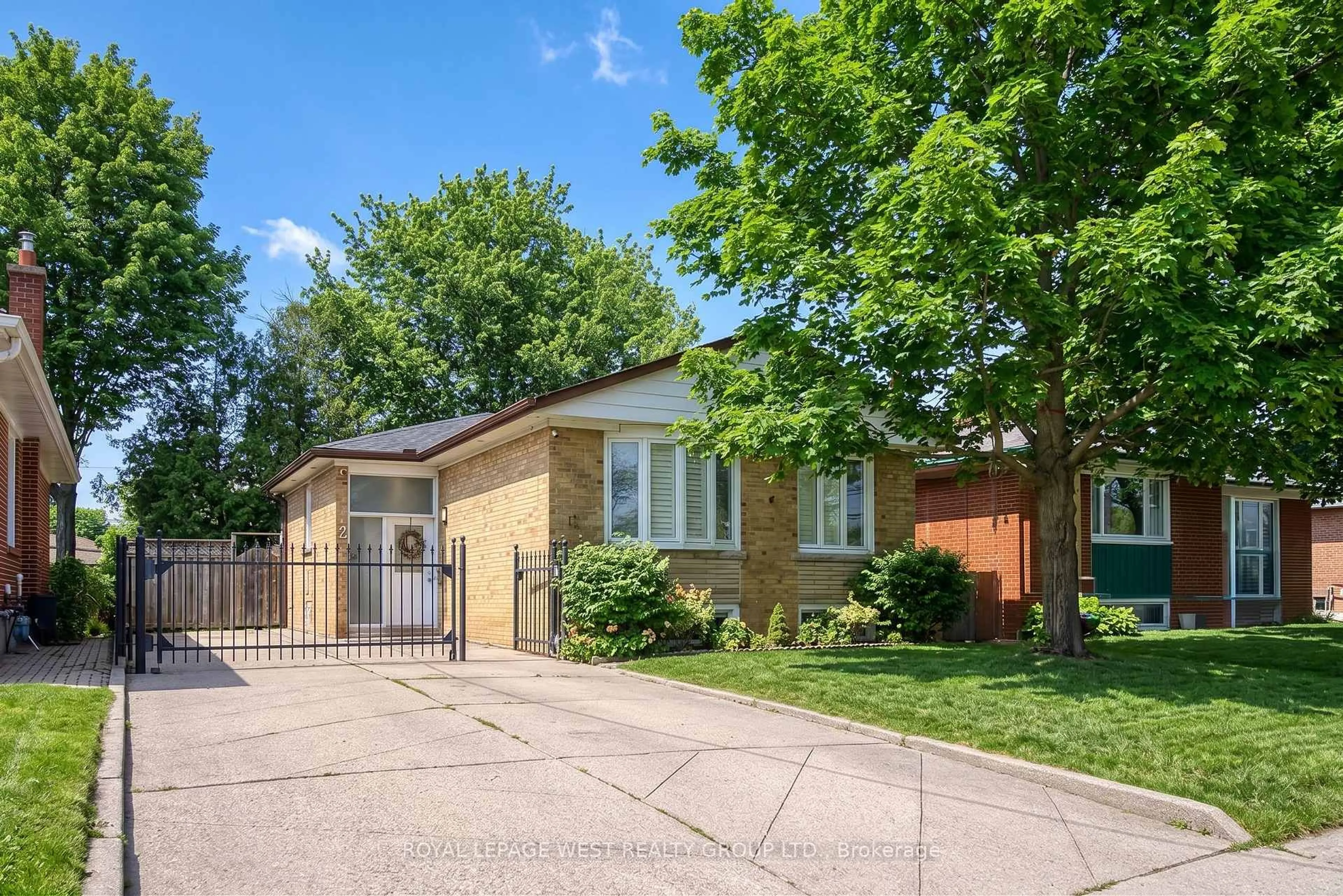Home with brick exterior material, street for 12 Leavenworth Cres, Toronto Ontario M9C 1T4