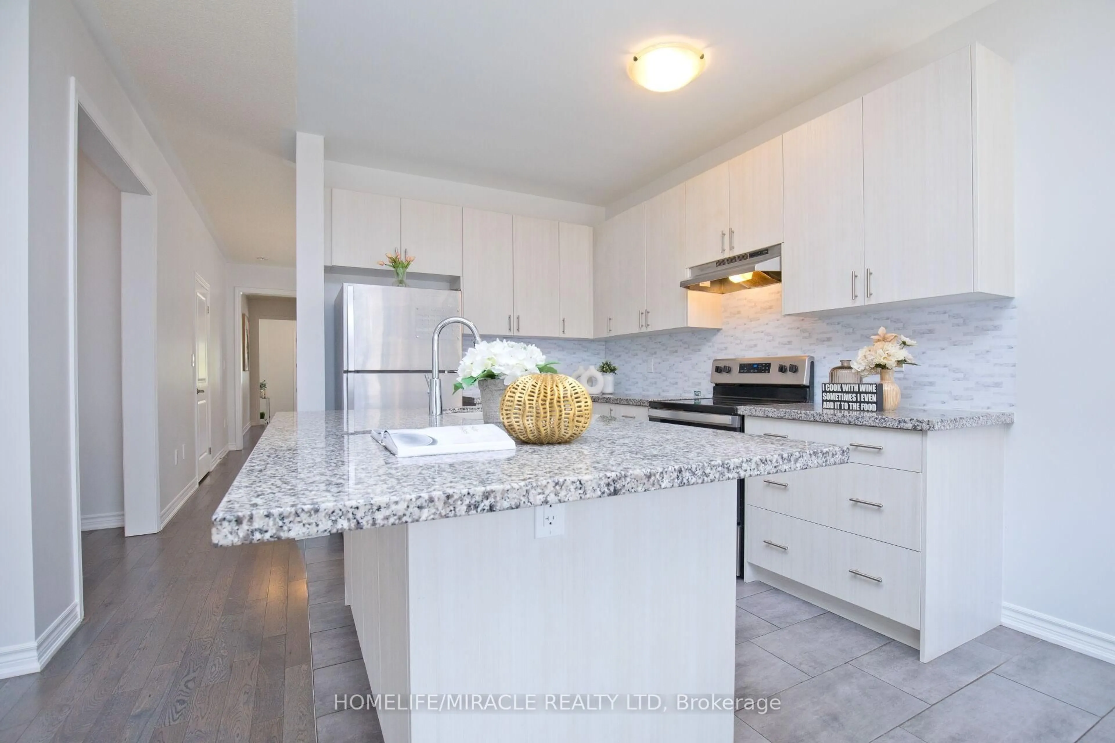 Open concept kitchen, ceramic/tile floor for 23 Pattulo Dr, Caledon Ontario L7C 4L1