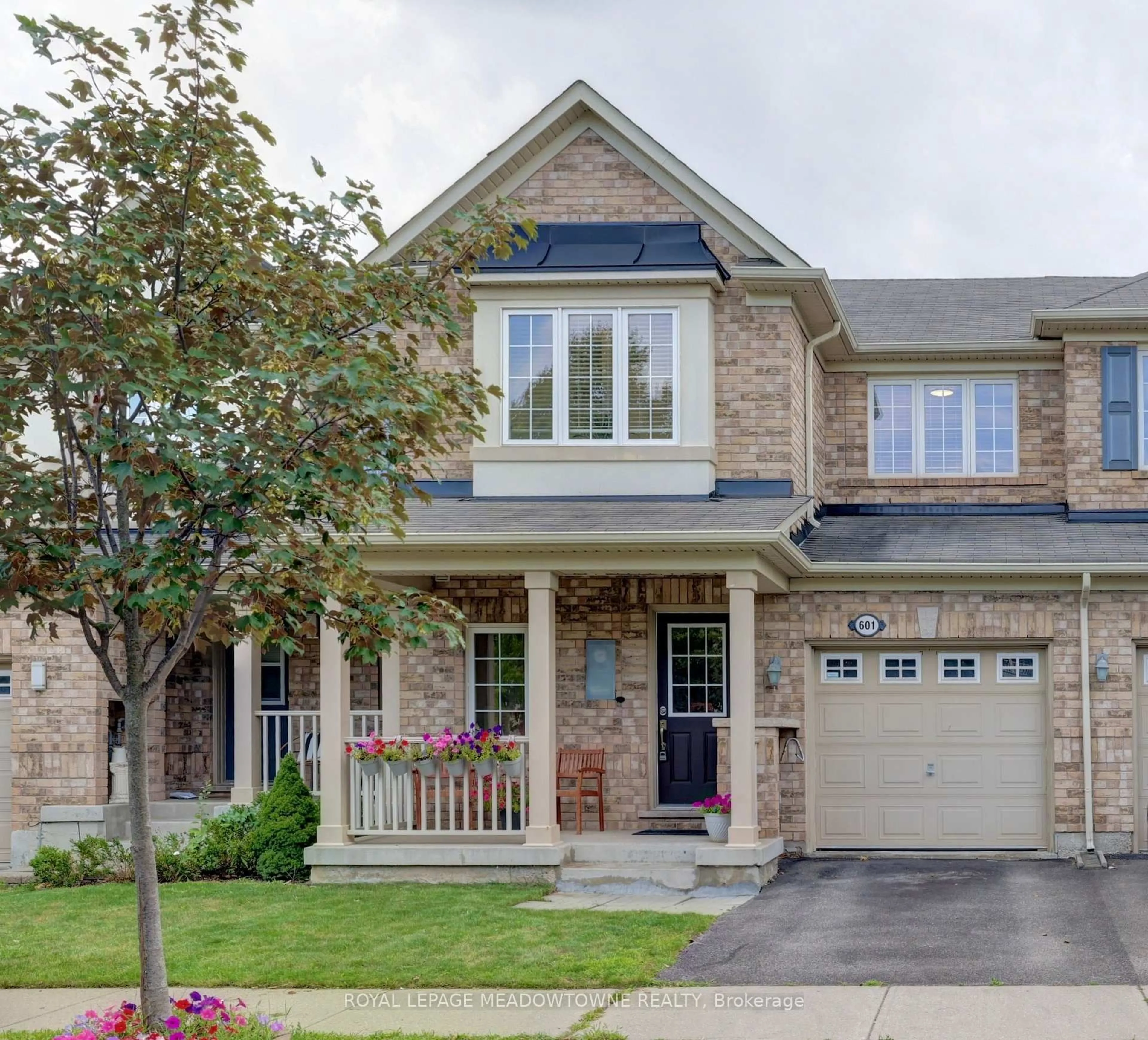 Home with brick exterior material, street for 601 Cargill Path, Milton Ontario L9T 7R6