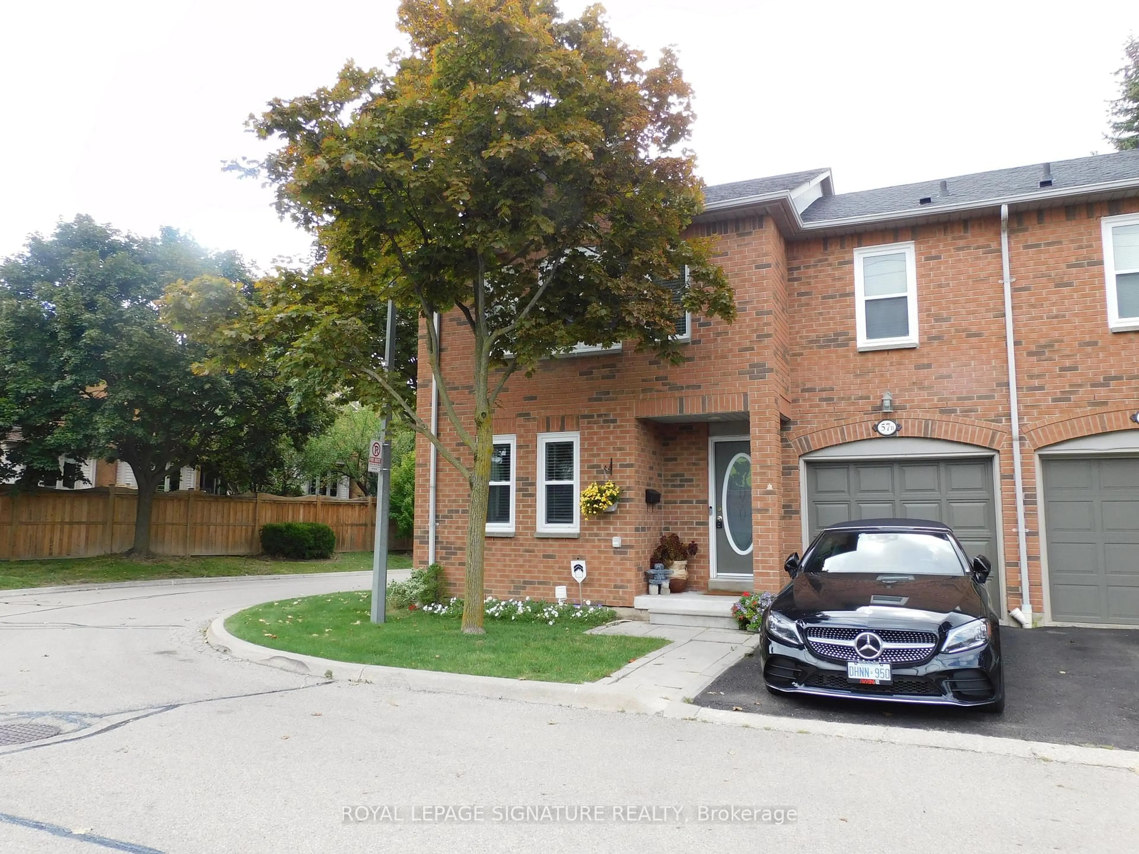 Home with brick exterior material, street for 5865 Dalebrook Cres #57B, Mississauga Ontario L5M 5X1