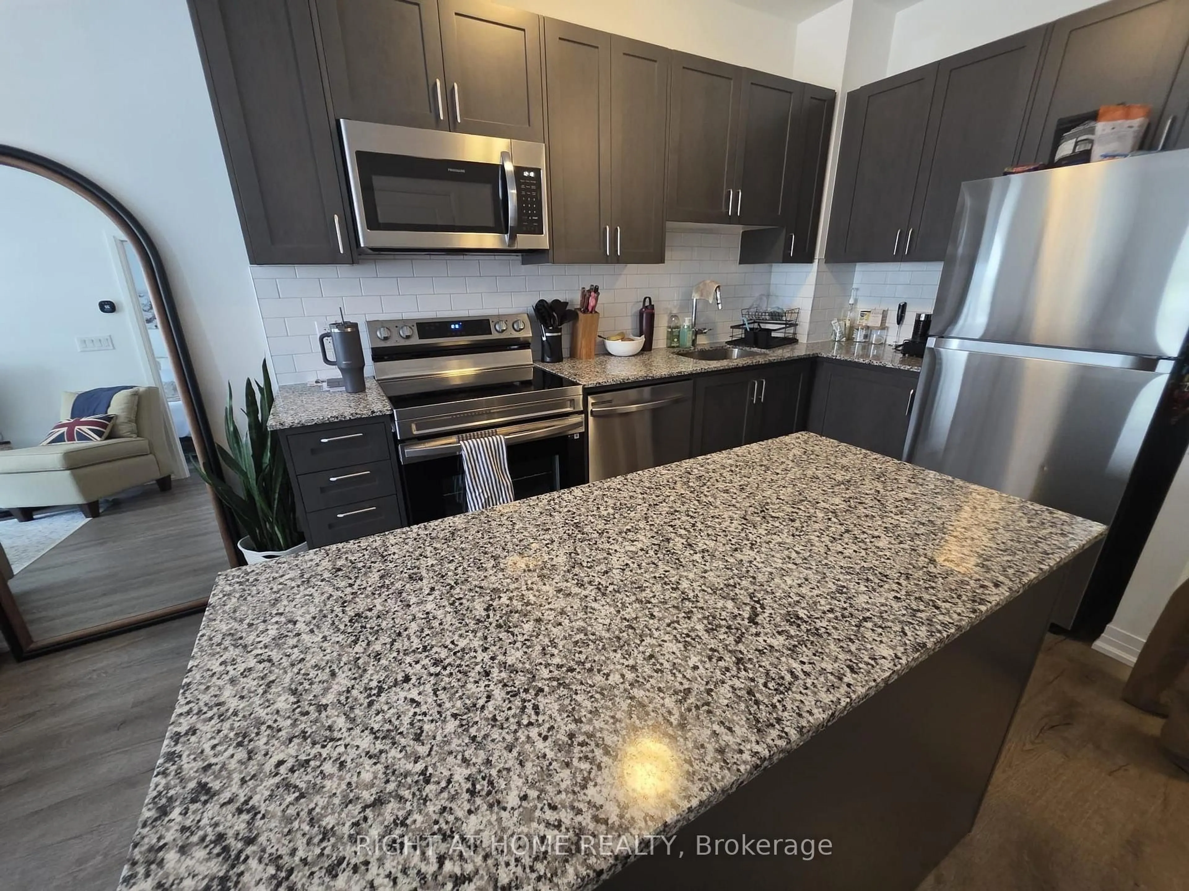 Open concept kitchen, unknown for 3285 Carding Mill Tr #204, Oakville Ontario L6M 5P7
