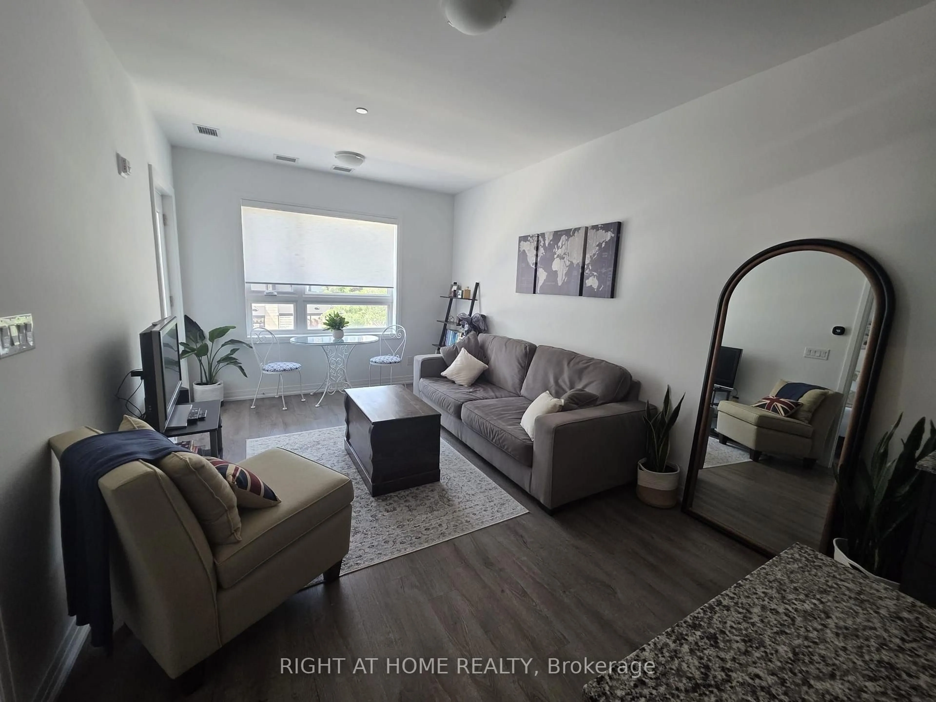 Living room with furniture, unknown for 3285 Carding Mill Tr #204, Oakville Ontario L6M 5P7