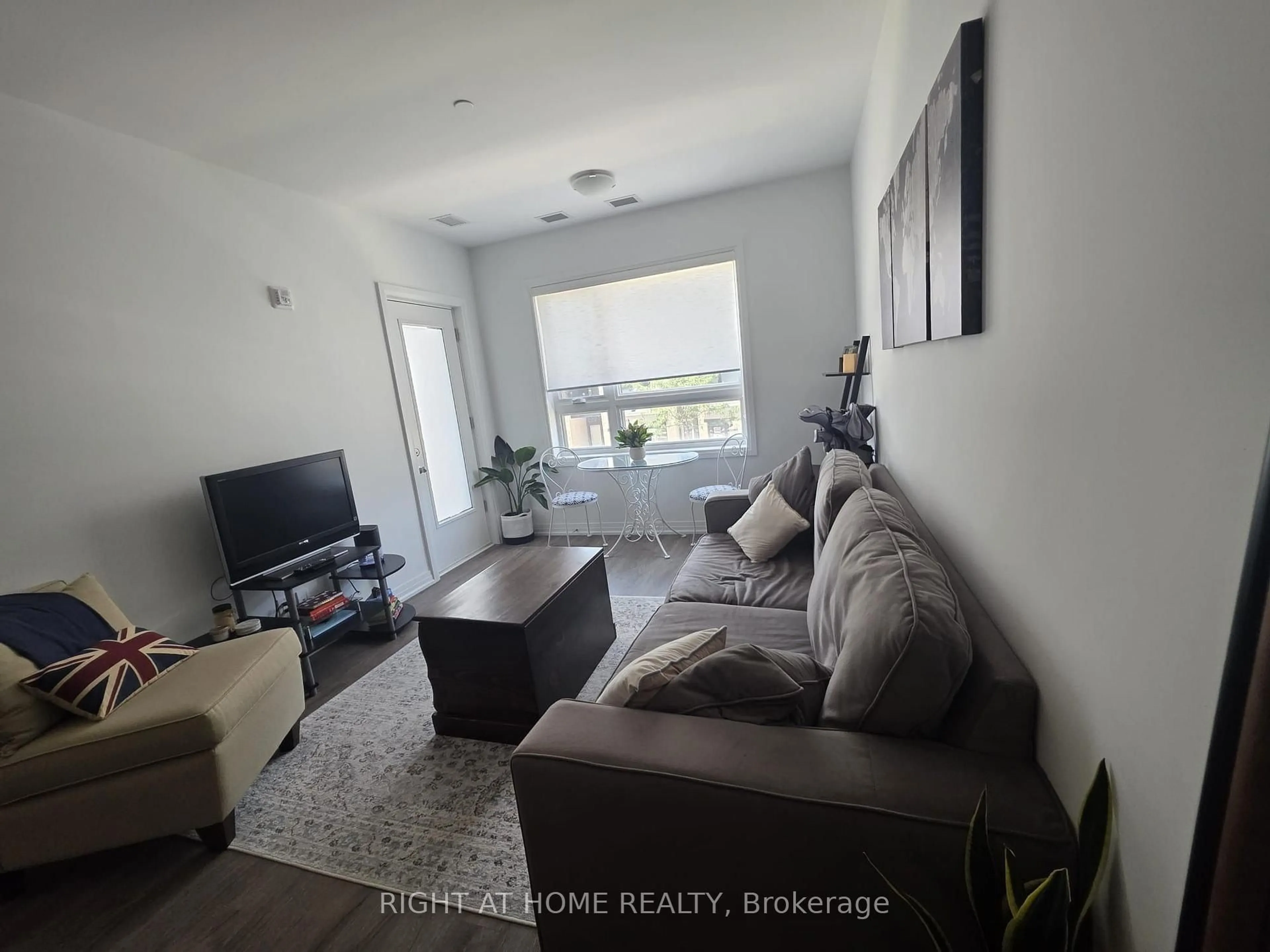 Living room with furniture, unknown for 3285 Carding Mill Tr #204, Oakville Ontario L6M 5P7