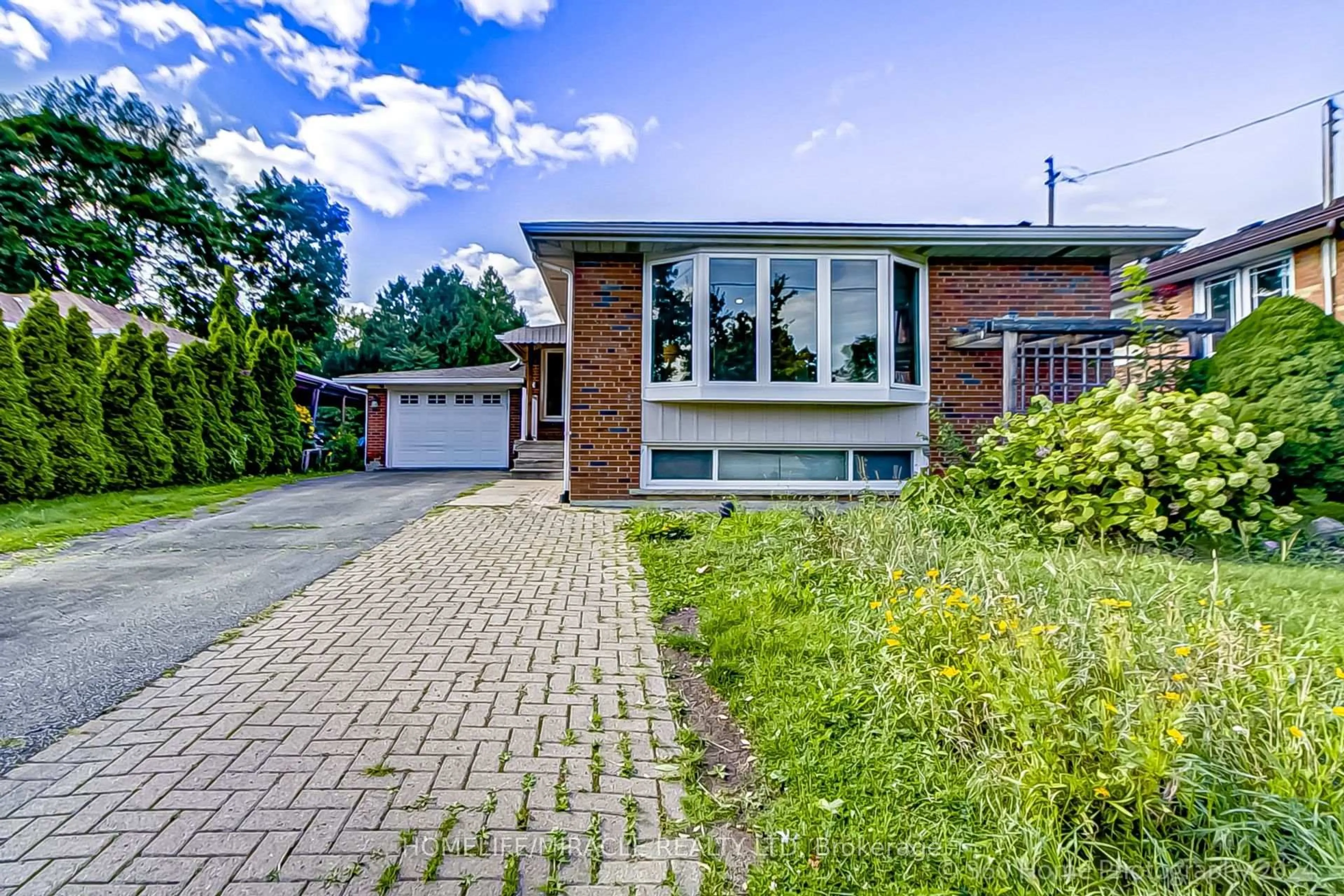 Home with brick exterior material, street for 30 Fallowfield Rd, Toronto Ontario M9W 2W2