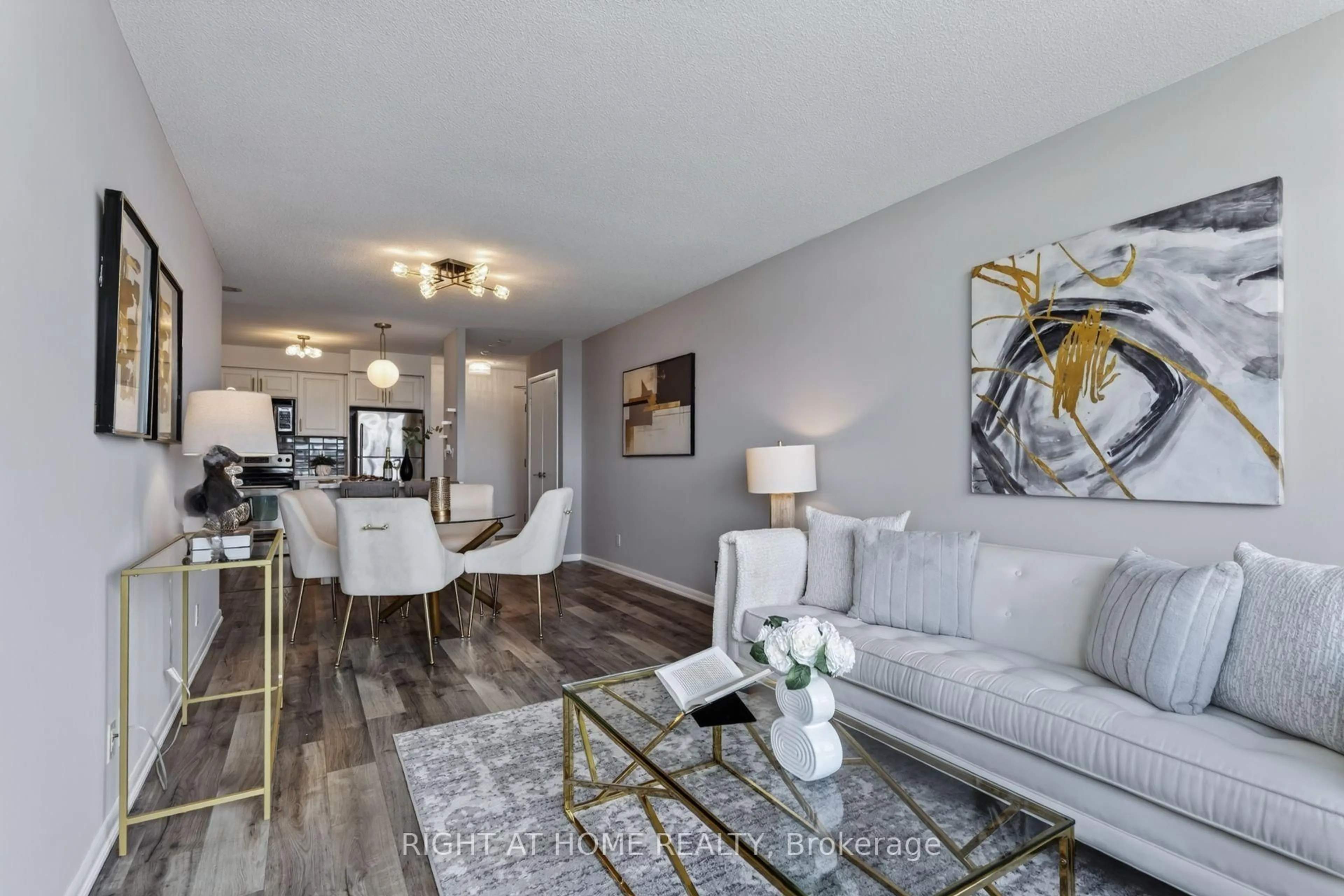 Living room with furniture, wood/laminate floor for 185 Legion Rd #1417, Toronto Ontario M8Y 0A1