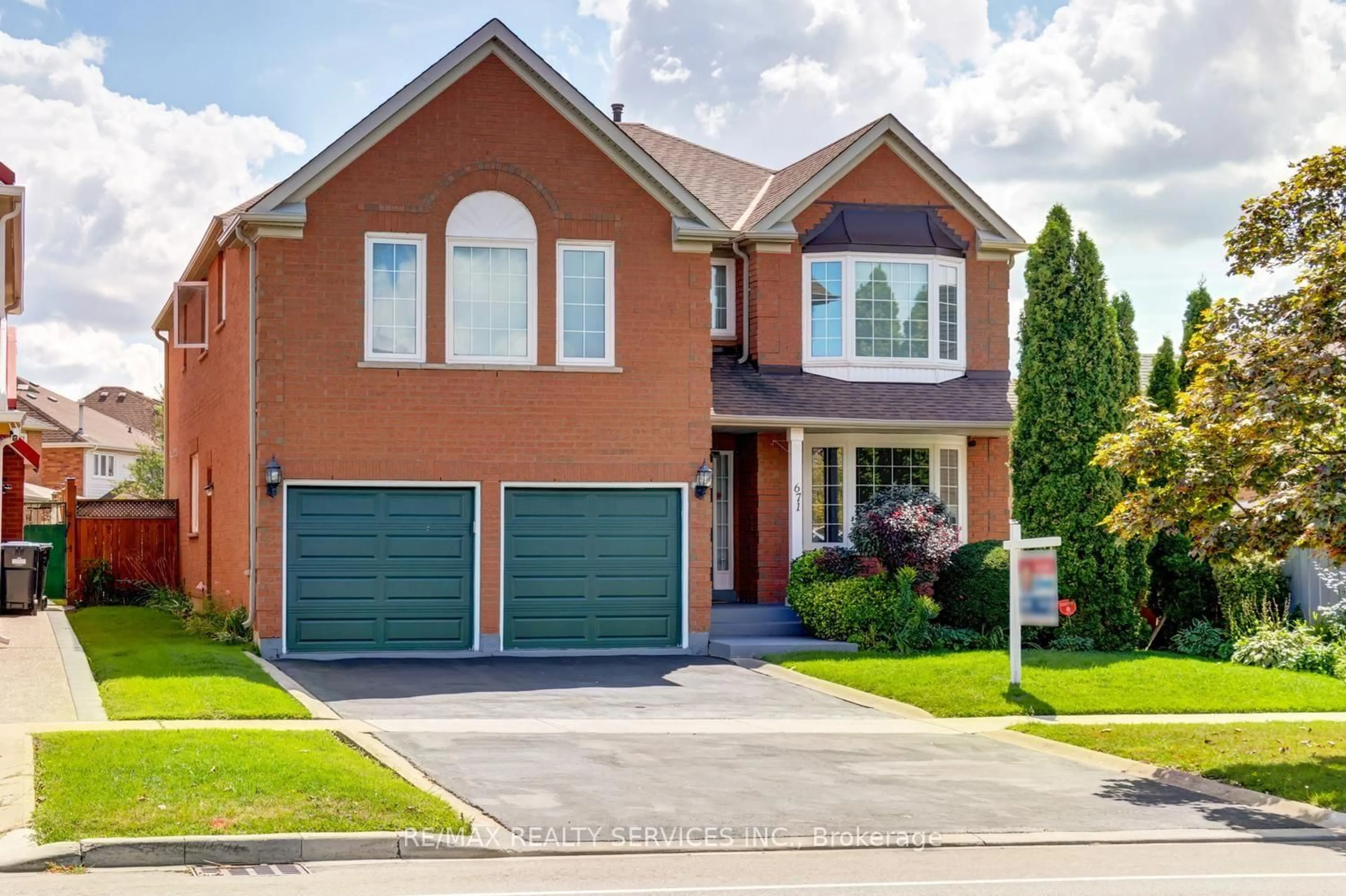 Home with brick exterior material, street for 671 Peter Robertson Blvd, Brampton Ontario L6R 1L8