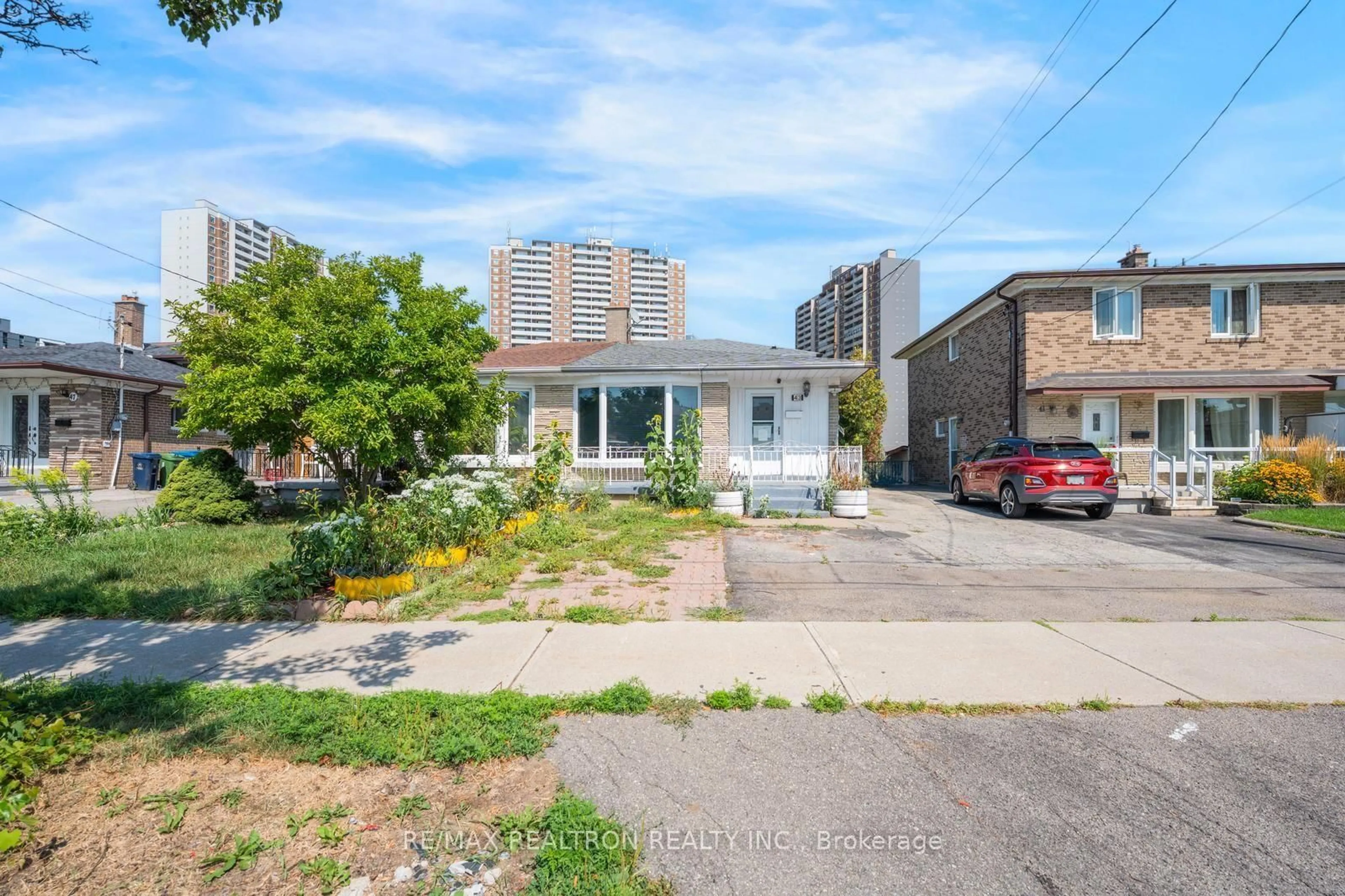 A pic from outside/outdoor area/front of a property/back of a property/a pic from drone, street for 43 Lindylou Rd, Toronto Ontario M9M 2B1
