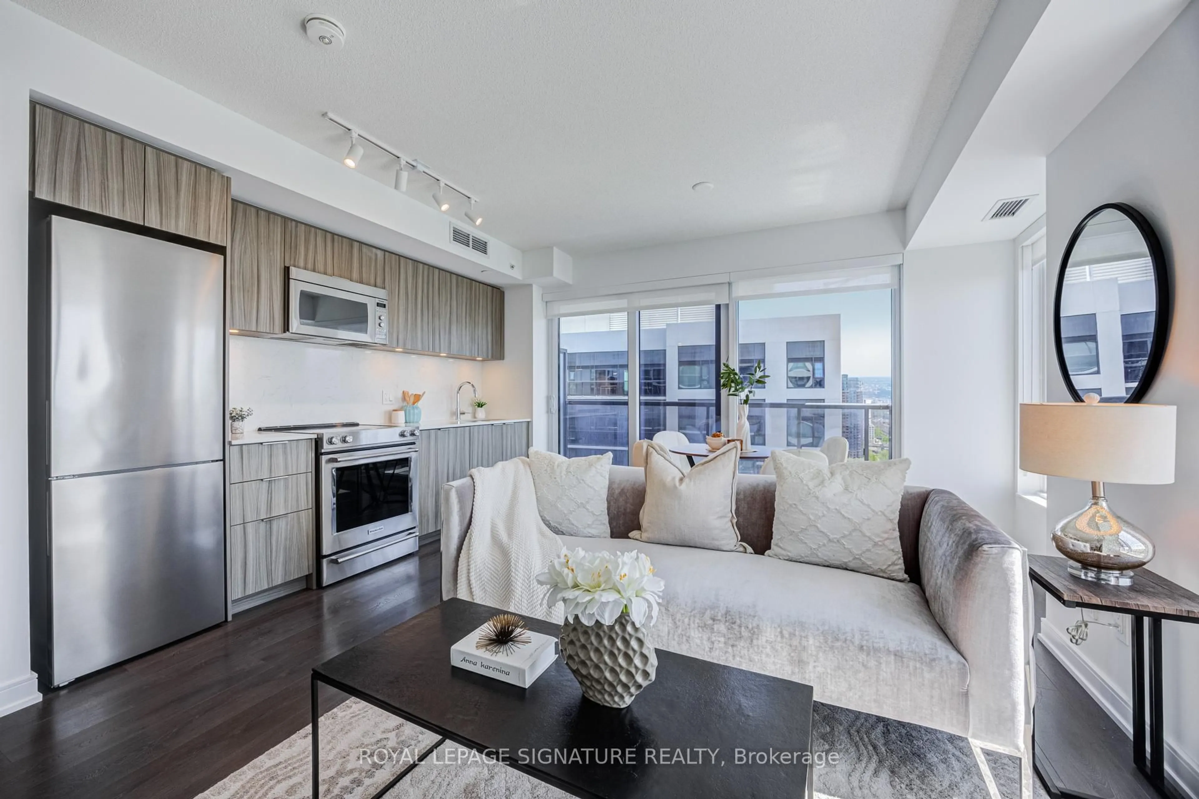 Living room with furniture, unknown for 30 Samuel Wood Way #2008, Toronto Ontario M9B 0C9