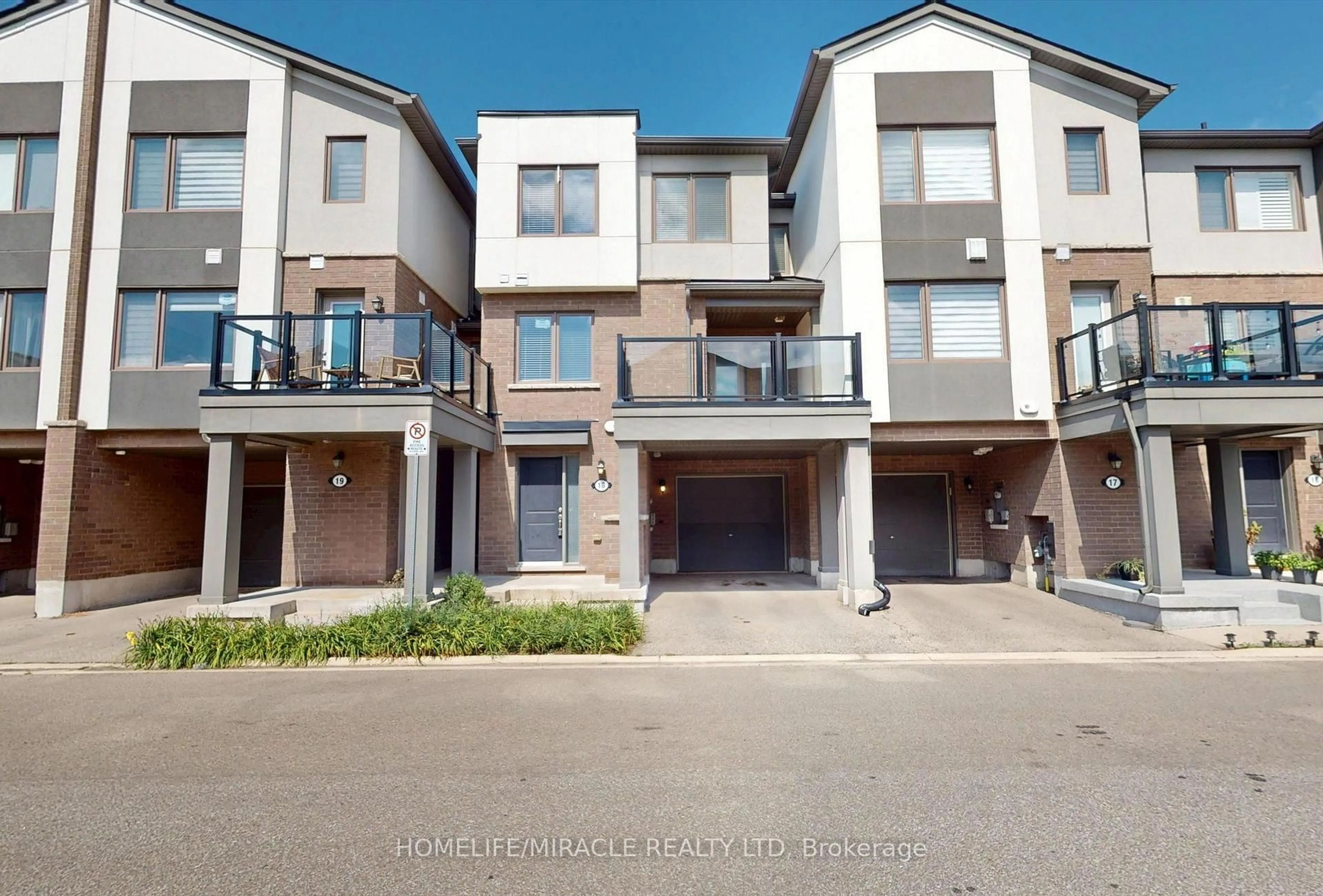 A pic from outside/outdoor area/front of a property/back of a property/a pic from drone, street for 1125 Leger Way #18, Milton Ontario L9E 1N7