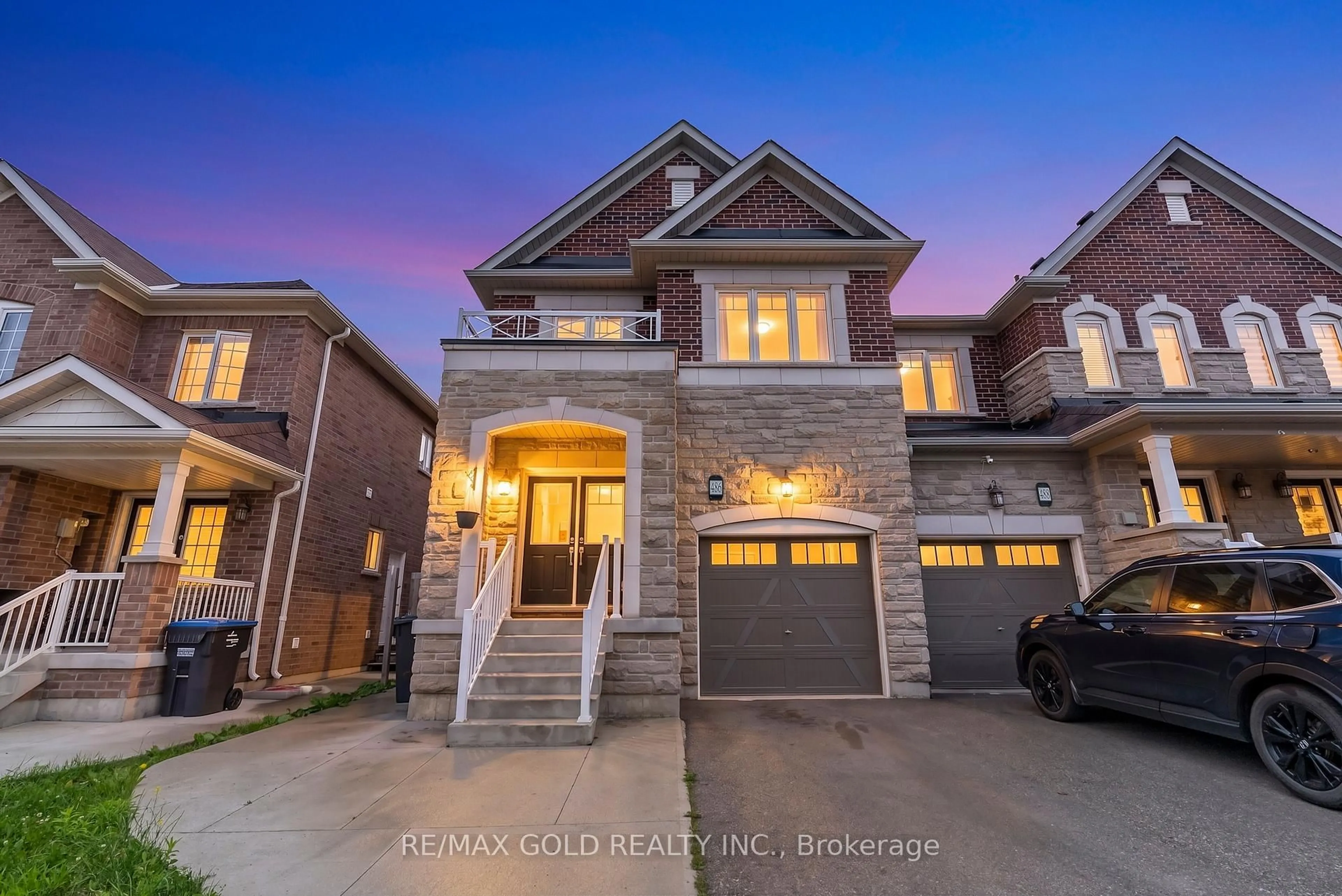 Home with brick exterior material, street for 486 Queen Mary Dr, Brampton Ontario L7A 4N3