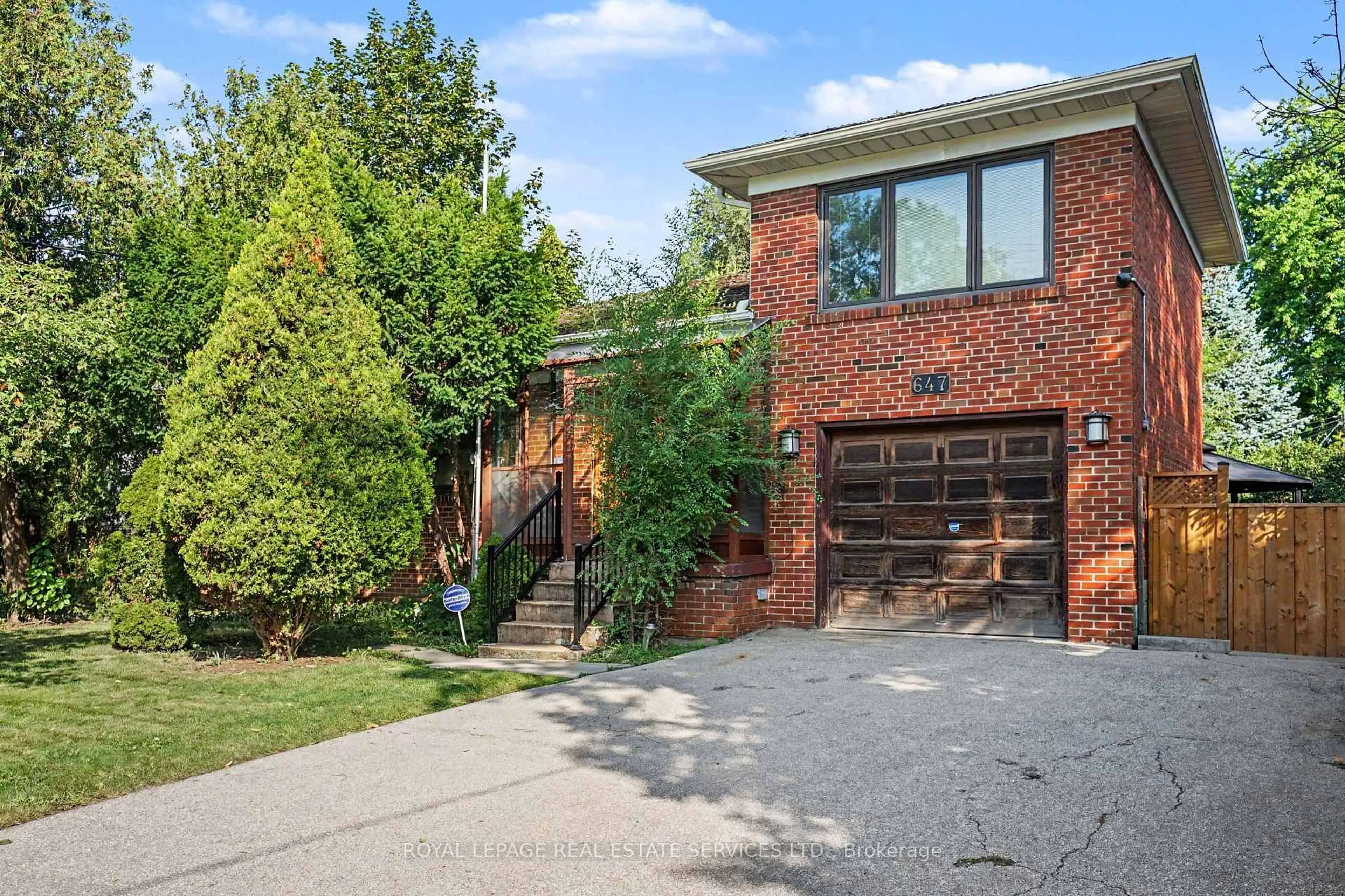 Home with brick exterior material, street for 647 Burnhamthorpe Rd, Toronto Ontario M9C 2Z1