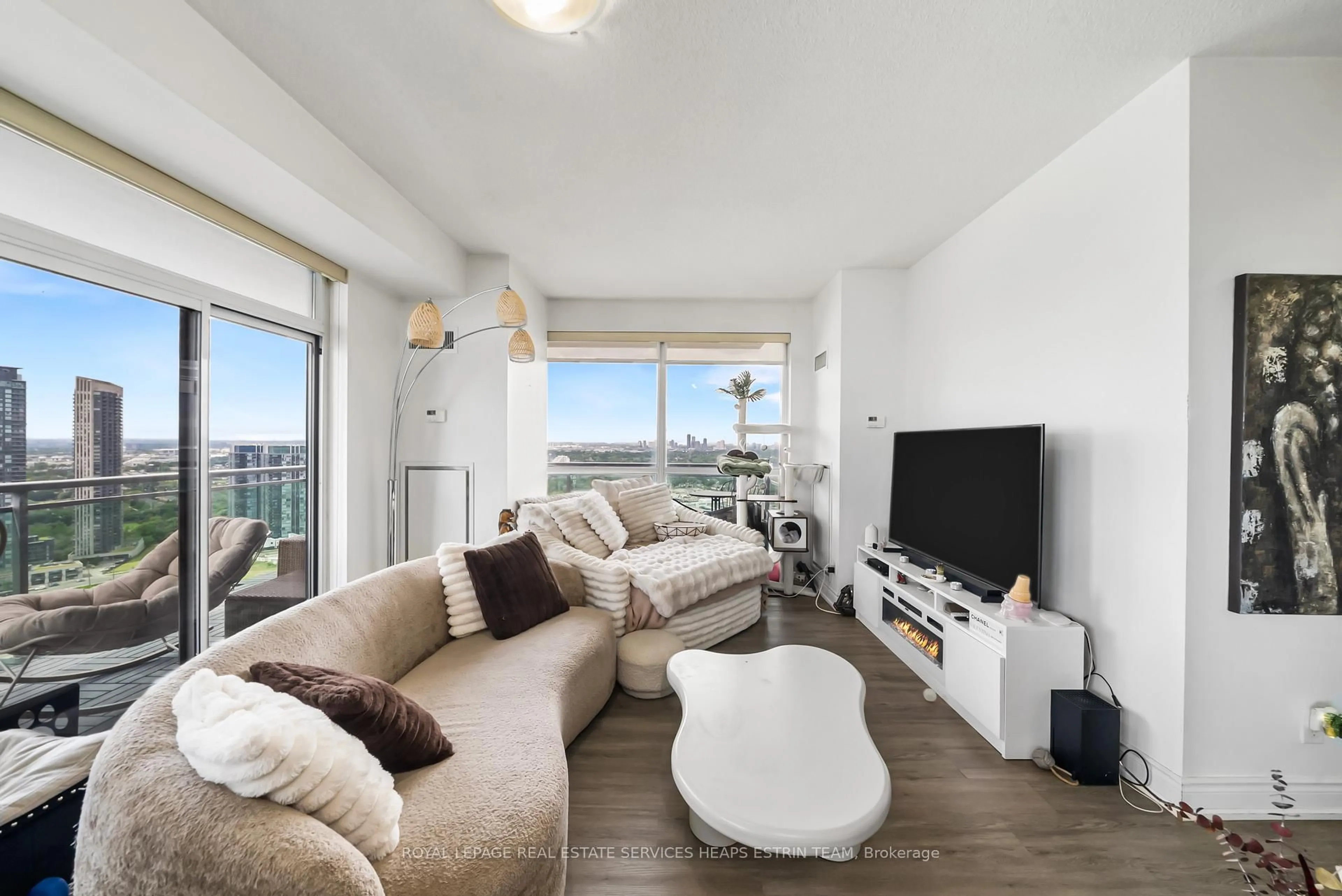 Living room with furniture, wood/laminate floor for 16 Brookers Lane #3301, Toronto Ontario M8V 0A5