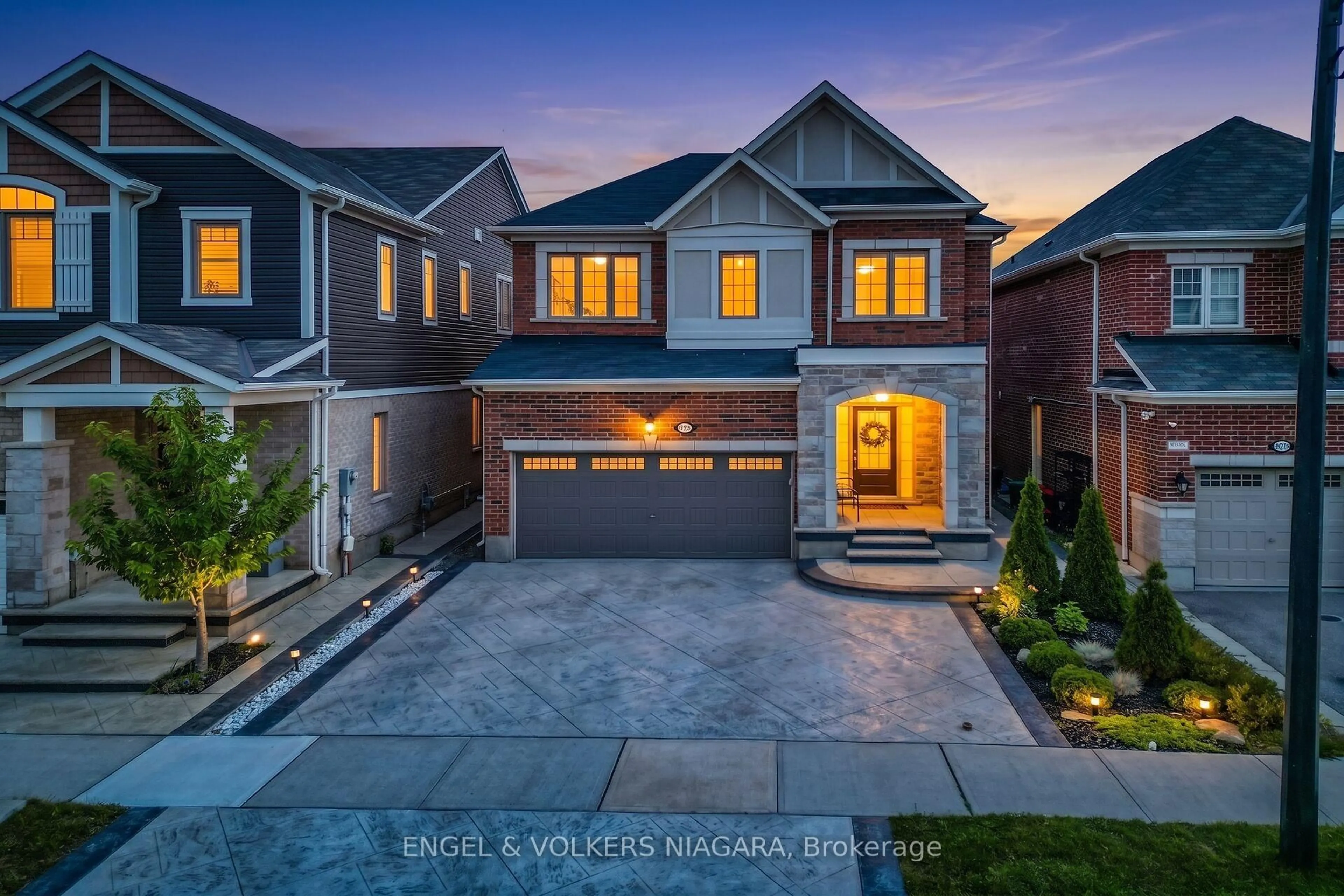 Home with brick exterior material, street for 1221 Rose Way, Milton Ontario L9E 1L9