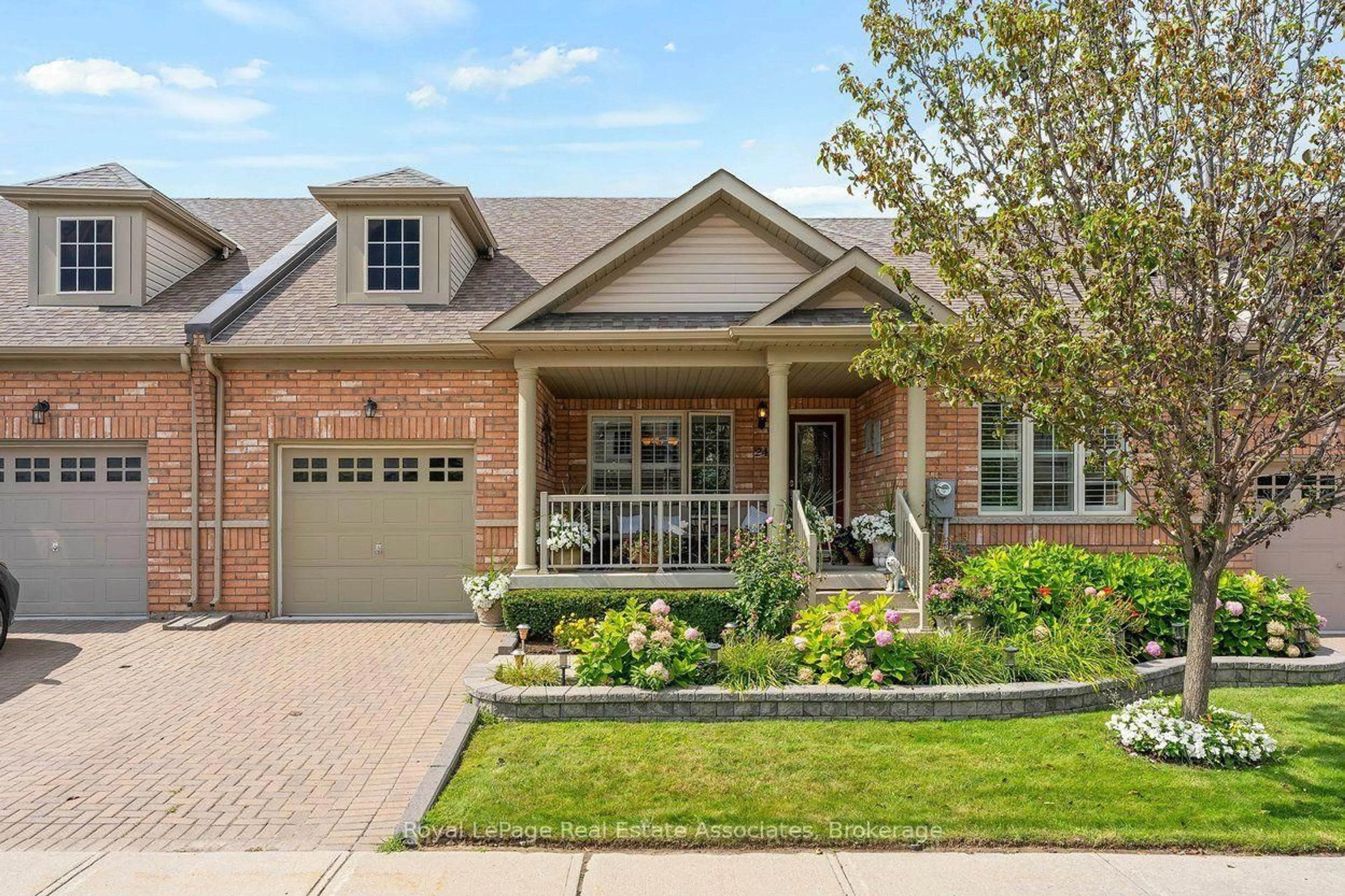 Home with brick exterior material, street for 24 Lacorra Way, Brampton Ontario L6R 3P2