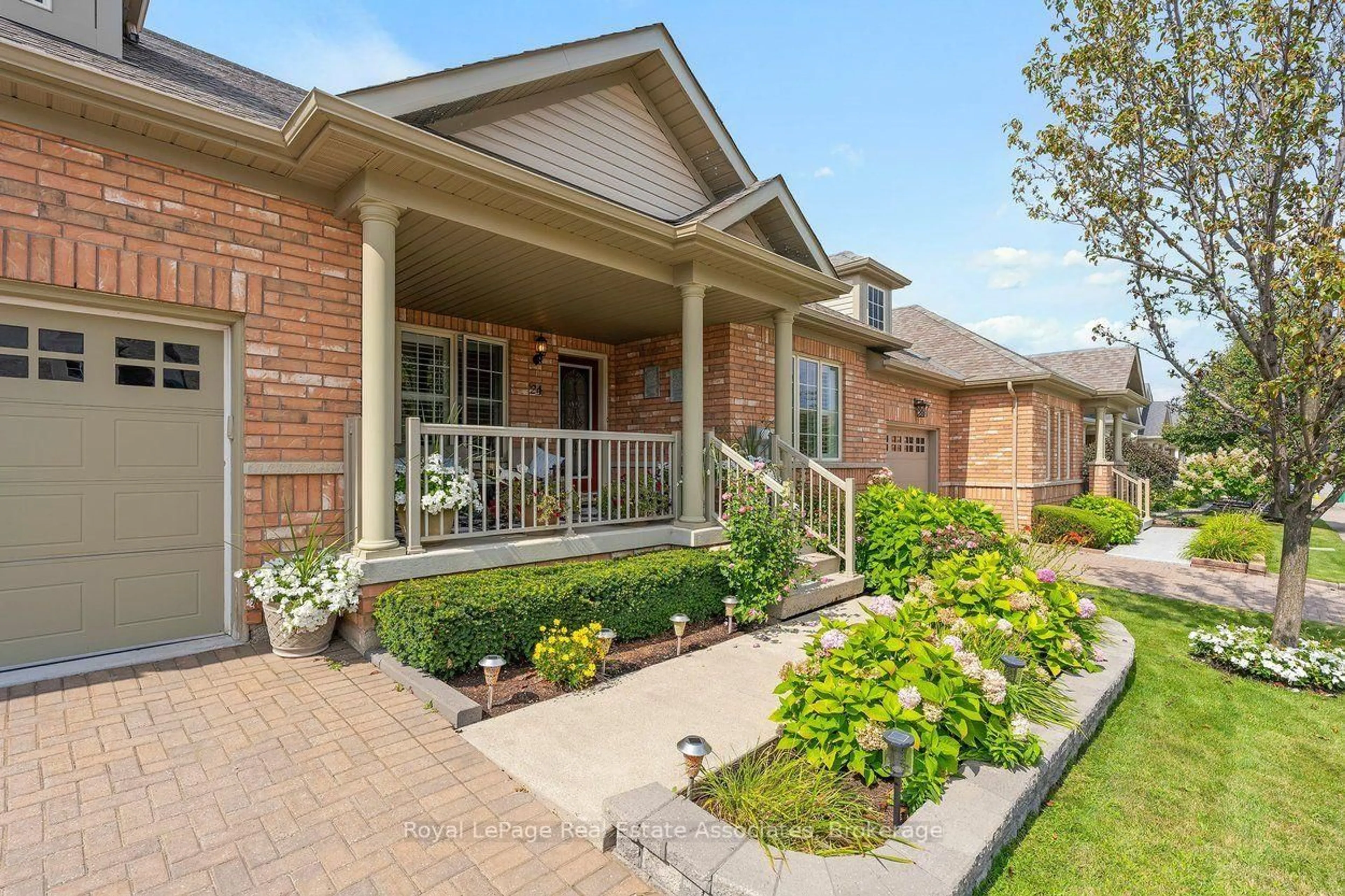 Home with brick exterior material, street for 24 Lacorra Way, Brampton Ontario L6R 3P2
